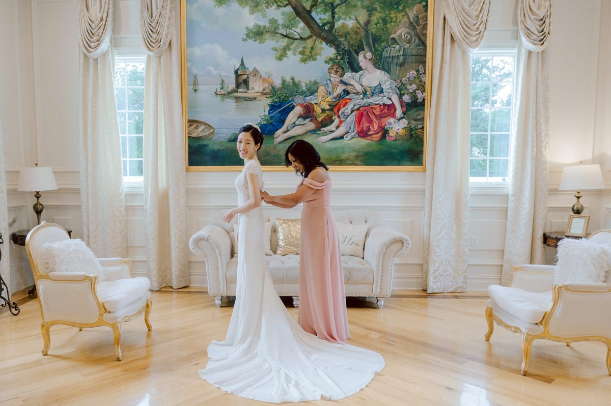 Jane and Kevin's day time wedding at The Estate at Florentine Gardens NJ on September 16, 2023 was nothing spectacular or luxurious but Jane and Kevin's fall wedding at The Estate at Florentine Gardens located in Northern NJ was real, sincere and sweet. Jane and Kevin kept everything real, their wedding was not to show off but really celebrate with their amazing friends and family. Jane and Kevin chose a church wedding ceremony at their church Grace Redeemer Church in Glen Rock NJ where their own pastor married them. Then we hurried back to Florentine Gardens for family and some more couple's photos before entering into Jane and Kevin's wedding reception at Florentine Gardens. Even though it was a day time wedding Jane and Kevin's friends along with their family danced away as if it was midnight! Jane and Kevin's The Estate at Florentine Gardens NJ Wedding photographed and documented by by Karis | Hey Karis | Catskills, Hudson Valley NY elopement and wedding photographer | Brooklyn NY elopement and wedding photographer | Manhattan NY elopement and wedding photographer | Hey Karis is fun documentary wedding and elopement photographer.