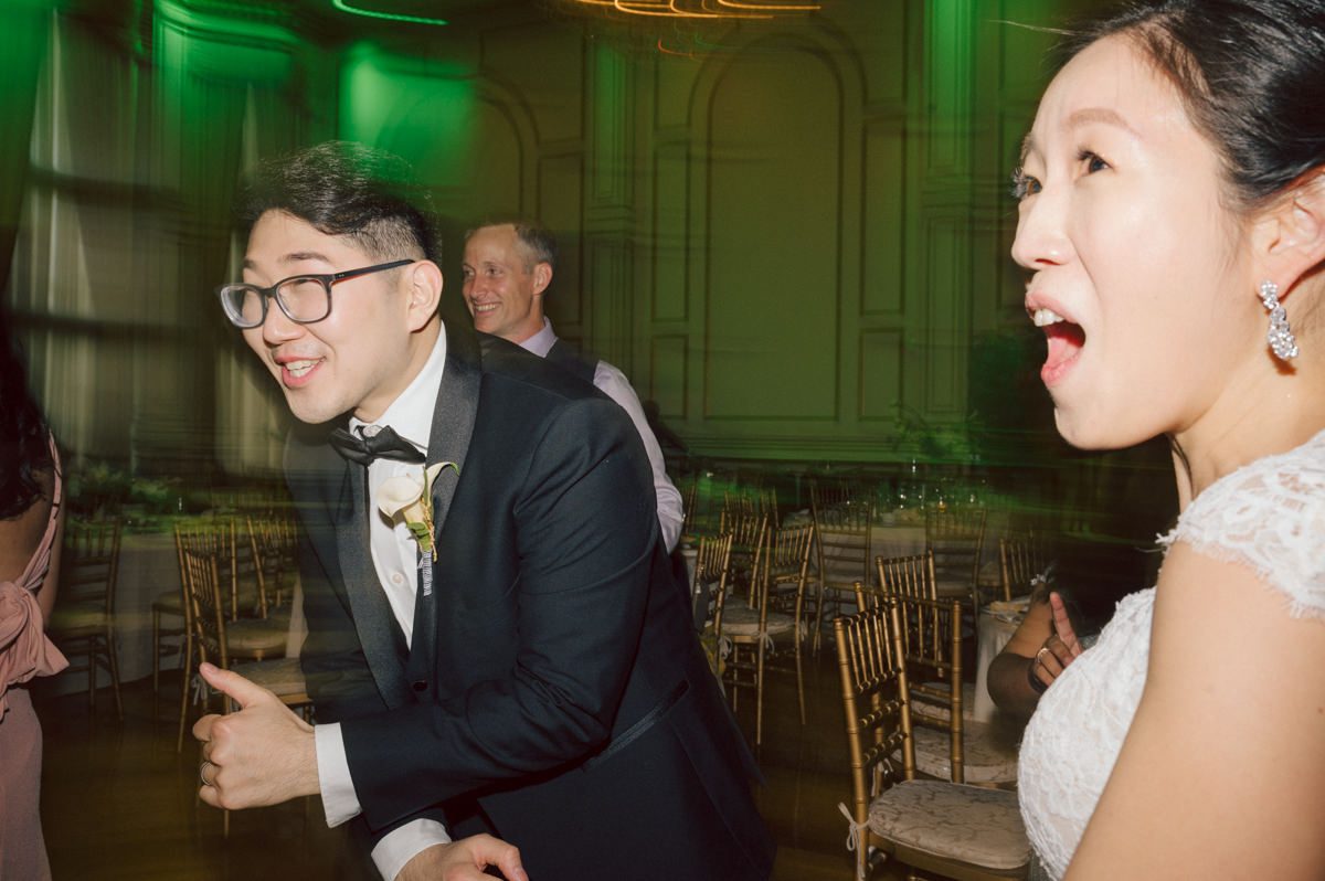 Jane and Kevin's day time wedding at The Estate at Florentine Gardens NJ on September 16, 2023 was nothing spectacular or luxurious but Jane and Kevin's fall wedding at The Estate at Florentine Gardens located in Northern NJ was real, sincere and sweet. Jane and Kevin kept everything real, their wedding was not to show off but really celebrate with their amazing friends and family. Jane and Kevin chose a church wedding ceremony at their church Grace Redeemer Church in Glen Rock NJ where their own pastor married them. Then we hurried back to Florentine Gardens for family and some more couple's photos before entering into Jane and Kevin's wedding reception at Florentine Gardens. Even though it was a day time wedding Jane and Kevin's friends along with their family danced away as if it was midnight! Jane and Kevin's The Estate at Florentine Gardens NJ Wedding photographed and documented by by Karis | Hey Karis | Catskills, Hudson Valley NY elopement and wedding photographer | Brooklyn NY elopement and wedding photographer | Manhattan NY elopement and wedding photographer | Hey Karis is fun documentary wedding and elopement photographer.