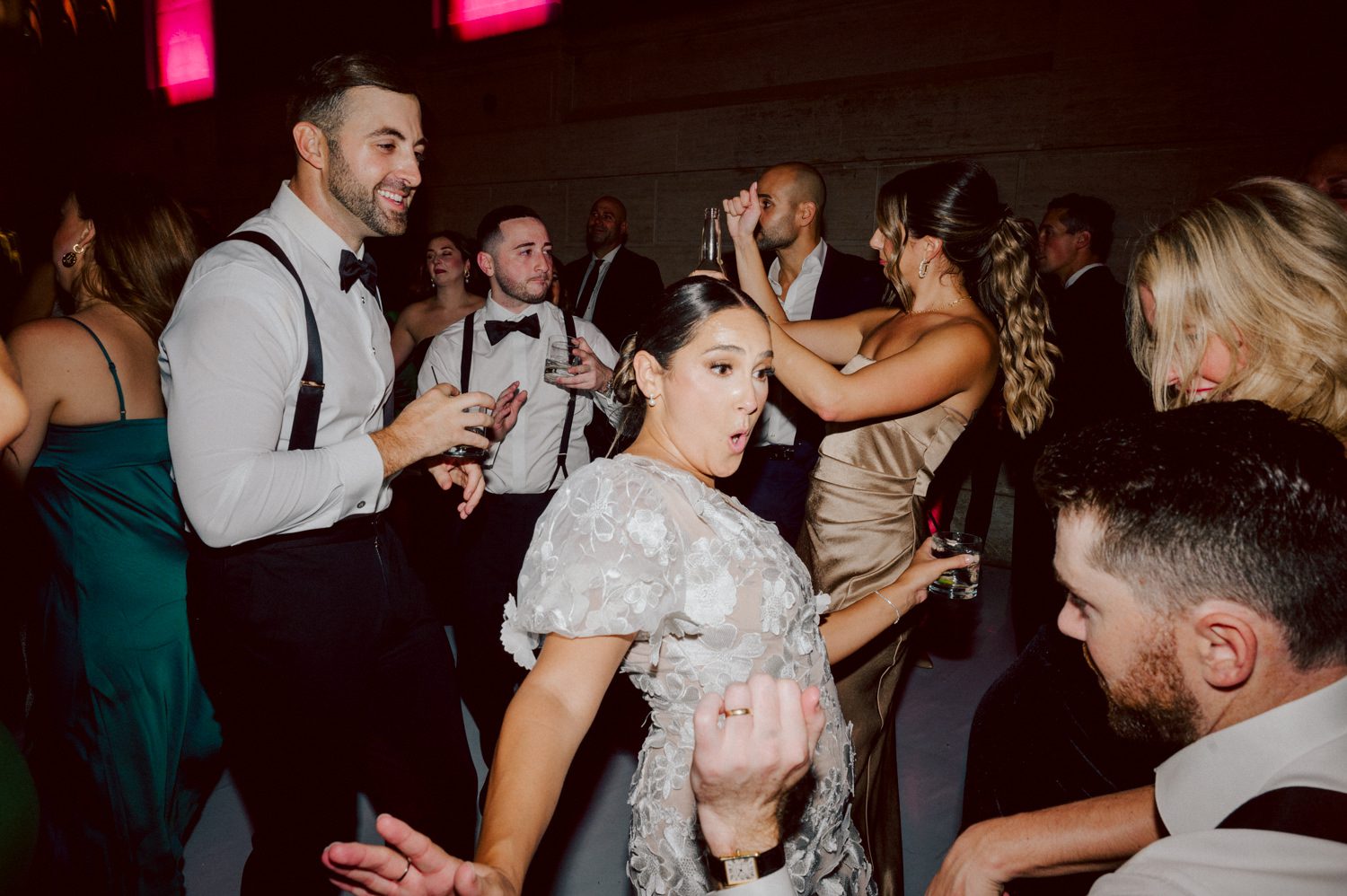 Bianca and Mike's The Union Trust Philadelphia wedding. I met Bianca and Mike at Julie and Thomas's wedding in 2021, Bianca was Julie's bridesmaid and best friend. Bianca and Mike new to book me for their wedding so as soon as they found their dream wedding venue The Union Trust in Philadelphia they emailed me. Honestly these previous couple's referrals are the best because they've already seen me work, familiar with my work and they are my true fans. Bianca got ready onsite at The Union Trust's bridal suit where the lighting was bit wonky with no natural light but hey I make it work! While Bianca was busy getting ready Mike and his buddies were over at Renaissance Hotel Philadelphia. Bianca and Mike also opted out of First Look, Bianca walking down the aisle at St. Augustine’s Philadelphia was when the couple saw each other for the first time and of course their eyes got watery. Bianca and Mike rang the wedding bell at St. Augustine’s Philadelphia and screamed with their arms raised as they exited St. Augustine as husband and wife. It was 4 in the afternoon, everyone loaded on the party bus we drove straight to historic Merchant Exchange Building Philadelphia for photos. The light, the weather was perfect, and surrounded by great people we wrapped up all our formal wedding portraits and now only word PARTY was on everyone's mind including the newly wed Bianca and Mike. Back at The Union Trust Ballroom, florists were busy decorating and entertainment crew was setting up. Together they turned this gorgeous Union Trust Ballroom, into chick and modern vibe. Bianca and Mike entered the ballroom and it was ON for the rest of the evening with party people filling the dance floor at The Union Trust, happily celebrating the union of their favorite people Bianca and Mike. Bianca and Mike's The Union Trust Philadelphia wedding photographed and documented by by Karis | Hey Karis | Catskills, Hudson Valley NY elopement and wedding photographer | Brooklyn NY elopement and wedding photographer | Manhattan NY elopement and wedding photographer | Hey Karis is fun documentary wedding and elopement photographer.