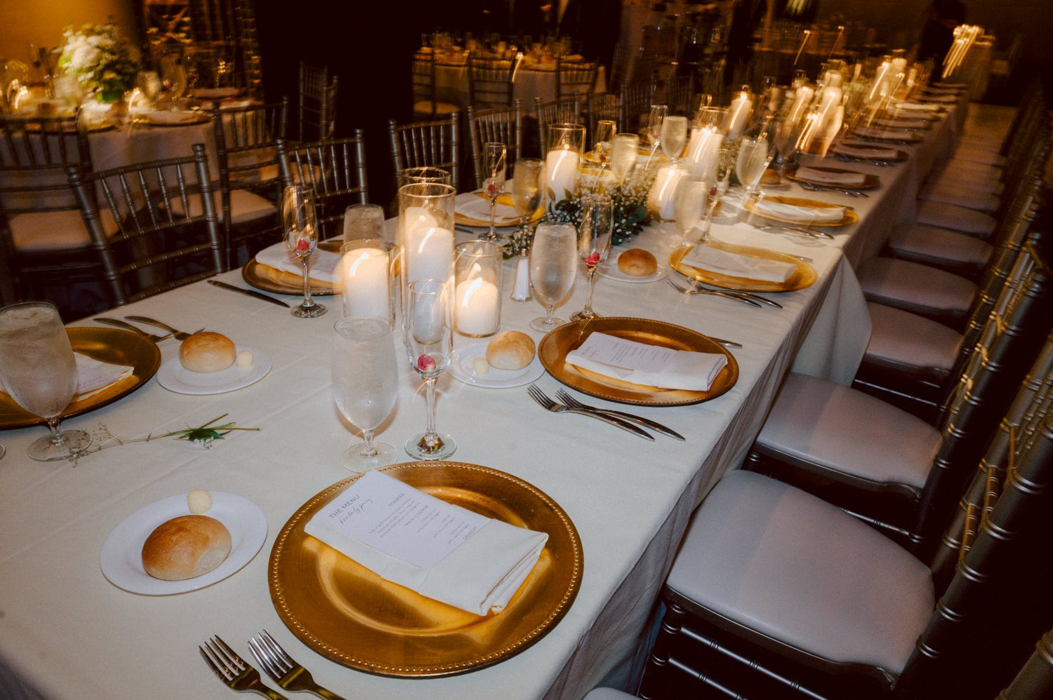 Bianca and Mike's The Union Trust Philadelphia wedding. I met Bianca and Mike at Julie and Thomas's wedding in 2021, Bianca was Julie's bridesmaid and best friend. Bianca and Mike new to book me for their wedding so as soon as they found their dream wedding venue The Union Trust in Philadelphia they emailed me. Honestly these previous couple's referrals are the best because they've already seen me work, familiar with my work and they are my true fans. Bianca got ready onsite at The Union Trust's bridal suit where the lighting was bit wonky with no natural light but hey I make it work! While Bianca was busy getting ready Mike and his buddies were over at Renaissance Hotel Philadelphia. Bianca and Mike also opted out of First Look, Bianca walking down the aisle at St. Augustine’s Philadelphia was when the couple saw each other for the first time and of course their eyes got watery. Bianca and Mike rang the wedding bell at St. Augustine’s Philadelphia and screamed with their arms raised as they exited St. Augustine as husband and wife. It was 4 in the afternoon, everyone loaded on the party bus we drove straight to historic Merchant Exchange Building Philadelphia for photos. The light, the weather was perfect, and surrounded by great people we wrapped up all our formal wedding portraits and now only word PARTY was on everyone's mind including the newly wed Bianca and Mike. Back at The Union Trust Ballroom, florists were busy decorating and entertainment crew was setting up. Together they turned this gorgeous Union Trust Ballroom, into chick and modern vibe. Bianca and Mike entered the ballroom and it was ON for the rest of the evening with party people filling the dance floor at The Union Trust, happily celebrating the union of their favorite people Bianca and Mike. Bianca and Mike's The Union Trust Philadelphia wedding photographed and documented by by Karis | Hey Karis | Catskills, Hudson Valley NY elopement and wedding photographer | Brooklyn NY elopement and wedding photographer | Manhattan NY elopement and wedding photographer | Hey Karis is fun documentary wedding and elopement photographer.