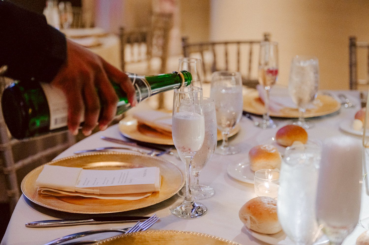 Bianca and Mike's The Union Trust Philadelphia wedding. I met Bianca and Mike at Julie and Thomas's wedding in 2021, Bianca was Julie's bridesmaid and best friend. Bianca and Mike new to book me for their wedding so as soon as they found their dream wedding venue The Union Trust in Philadelphia they emailed me. Honestly these previous couple's referrals are the best because they've already seen me work, familiar with my work and they are my true fans. Bianca got ready onsite at The Union Trust's bridal suit where the lighting was bit wonky with no natural light but hey I make it work! While Bianca was busy getting ready Mike and his buddies were over at Renaissance Hotel Philadelphia. Bianca and Mike also opted out of First Look, Bianca walking down the aisle at St. Augustine’s Philadelphia was when the couple saw each other for the first time and of course their eyes got watery. Bianca and Mike rang the wedding bell at St. Augustine’s Philadelphia and screamed with their arms raised as they exited St. Augustine as husband and wife. It was 4 in the afternoon, everyone loaded on the party bus we drove straight to historic Merchant Exchange Building Philadelphia for photos. The light, the weather was perfect, and surrounded by great people we wrapped up all our formal wedding portraits and now only word PARTY was on everyone's mind including the newly wed Bianca and Mike. Back at The Union Trust Ballroom, florists were busy decorating and entertainment crew was setting up. Together they turned this gorgeous Union Trust Ballroom, into chick and modern vibe. Bianca and Mike entered the ballroom and it was ON for the rest of the evening with party people filling the dance floor at The Union Trust, happily celebrating the union of their favorite people Bianca and Mike. Bianca and Mike's The Union Trust Philadelphia wedding photographed and documented by by Karis | Hey Karis | Catskills, Hudson Valley NY elopement and wedding photographer | Brooklyn NY elopement and wedding photographer | Manhattan NY elopement and wedding photographer | Hey Karis is fun documentary wedding and elopement photographer.