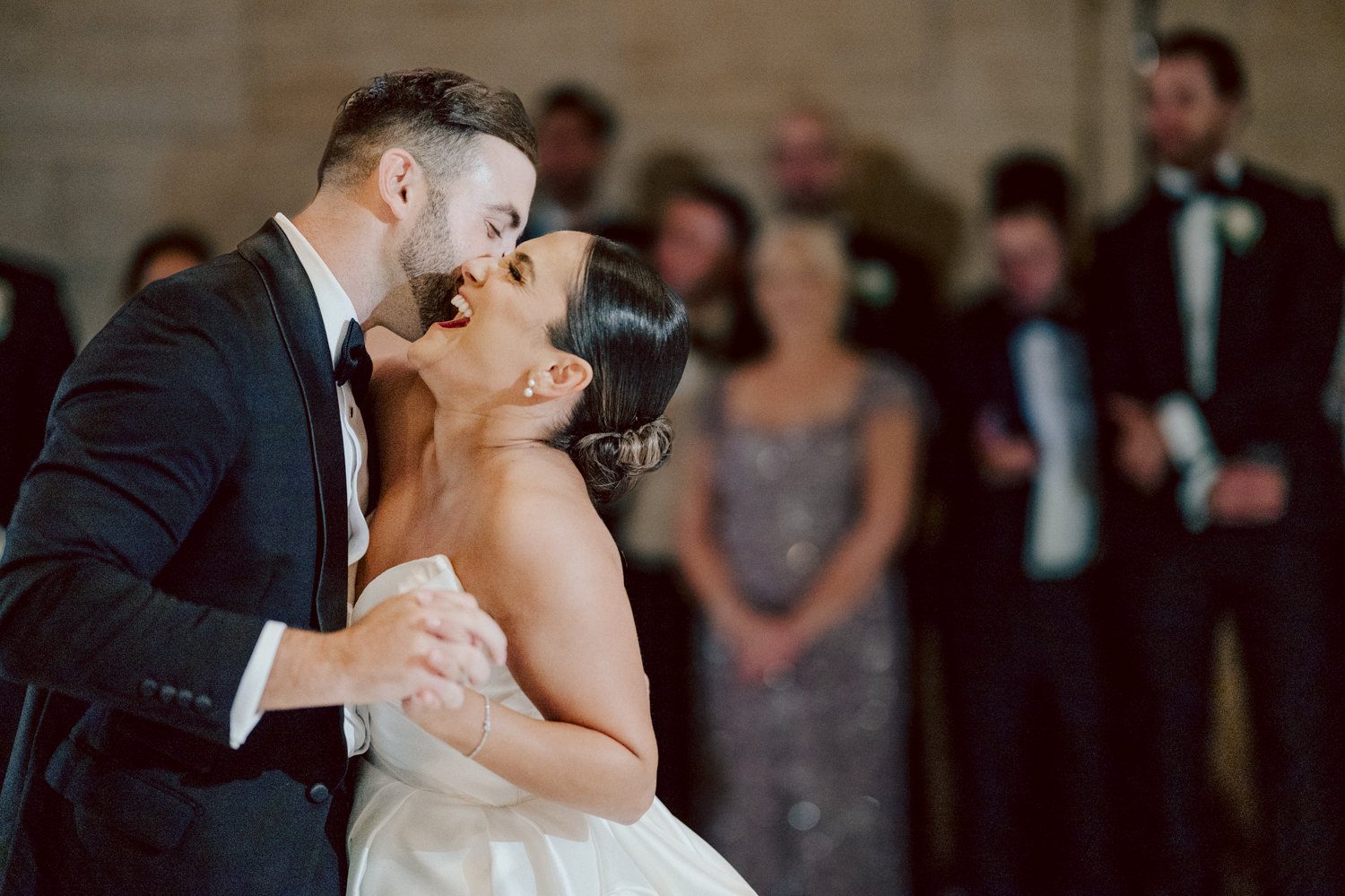 Bianca and Mike's The Union Trust Philadelphia wedding. I met Bianca and Mike at Julie and Thomas's wedding in 2021, Bianca was Julie's bridesmaid and best friend. Bianca and Mike new to book me for their wedding so as soon as they found their dream wedding venue The Union Trust in Philadelphia they emailed me. Honestly these previous couple's referrals are the best because they've already seen me work, familiar with my work and they are my true fans. Bianca got ready onsite at The Union Trust's bridal suit where the lighting was bit wonky with no natural light but hey I make it work! While Bianca was busy getting ready Mike and his buddies were over at Renaissance Hotel Philadelphia. Bianca and Mike also opted out of First Look, Bianca walking down the aisle at St. Augustine’s Philadelphia was when the couple saw each other for the first time and of course their eyes got watery. Bianca and Mike rang the wedding bell at St. Augustine’s Philadelphia and screamed with their arms raised as they exited St. Augustine as husband and wife. It was 4 in the afternoon, everyone loaded on the party bus we drove straight to historic Merchant Exchange Building Philadelphia for photos. The light, the weather was perfect, and surrounded by great people we wrapped up all our formal wedding portraits and now only word PARTY was on everyone's mind including the newly wed Bianca and Mike. Back at The Union Trust Ballroom, florists were busy decorating and entertainment crew was setting up. Together they turned this gorgeous Union Trust Ballroom, into chick and modern vibe. Bianca and Mike entered the ballroom and it was ON for the rest of the evening with party people filling the dance floor at The Union Trust, happily celebrating the union of their favorite people Bianca and Mike. Bianca and Mike's The Union Trust Philadelphia wedding photographed and documented by by Karis | Hey Karis | Catskills, Hudson Valley NY elopement and wedding photographer | Brooklyn NY elopement and wedding photographer | Manhattan NY elopement and wedding photographer | Hey Karis is fun documentary wedding and elopement photographer.