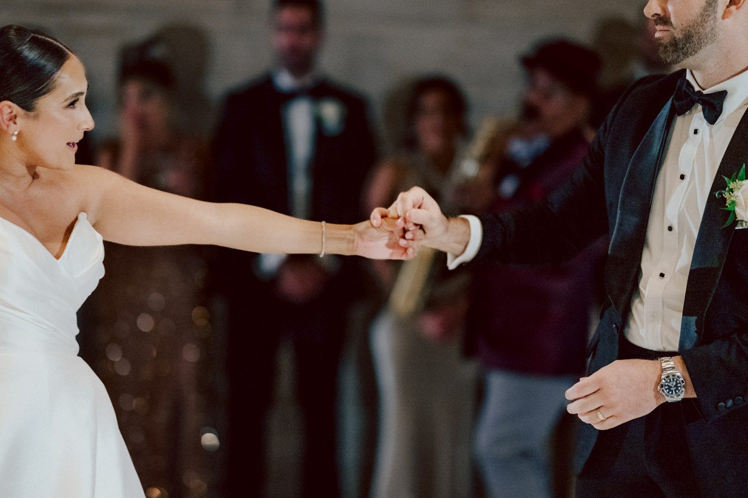 Bianca and Mike's The Union Trust Philadelphia wedding. I met Bianca and Mike at Julie and Thomas's wedding in 2021, Bianca was Julie's bridesmaid and best friend. Bianca and Mike new to book me for their wedding so as soon as they found their dream wedding venue The Union Trust in Philadelphia they emailed me. Honestly these previous couple's referrals are the best because they've already seen me work, familiar with my work and they are my true fans. Bianca got ready onsite at The Union Trust's bridal suit where the lighting was bit wonky with no natural light but hey I make it work! While Bianca was busy getting ready Mike and his buddies were over at Renaissance Hotel Philadelphia. Bianca and Mike also opted out of First Look, Bianca walking down the aisle at St. Augustine’s Philadelphia was when the couple saw each other for the first time and of course their eyes got watery. Bianca and Mike rang the wedding bell at St. Augustine’s Philadelphia and screamed with their arms raised as they exited St. Augustine as husband and wife. It was 4 in the afternoon, everyone loaded on the party bus we drove straight to historic Merchant Exchange Building Philadelphia for photos. The light, the weather was perfect, and surrounded by great people we wrapped up all our formal wedding portraits and now only word PARTY was on everyone's mind including the newly wed Bianca and Mike. Back at The Union Trust Ballroom, florists were busy decorating and entertainment crew was setting up. Together they turned this gorgeous Union Trust Ballroom, into chick and modern vibe. Bianca and Mike entered the ballroom and it was ON for the rest of the evening with party people filling the dance floor at The Union Trust, happily celebrating the union of their favorite people Bianca and Mike. Bianca and Mike's The Union Trust Philadelphia wedding photographed and documented by by Karis | Hey Karis | Catskills, Hudson Valley NY elopement and wedding photographer | Brooklyn NY elopement and wedding photographer | Manhattan NY elopement and wedding photographer | Hey Karis is fun documentary wedding and elopement photographer.