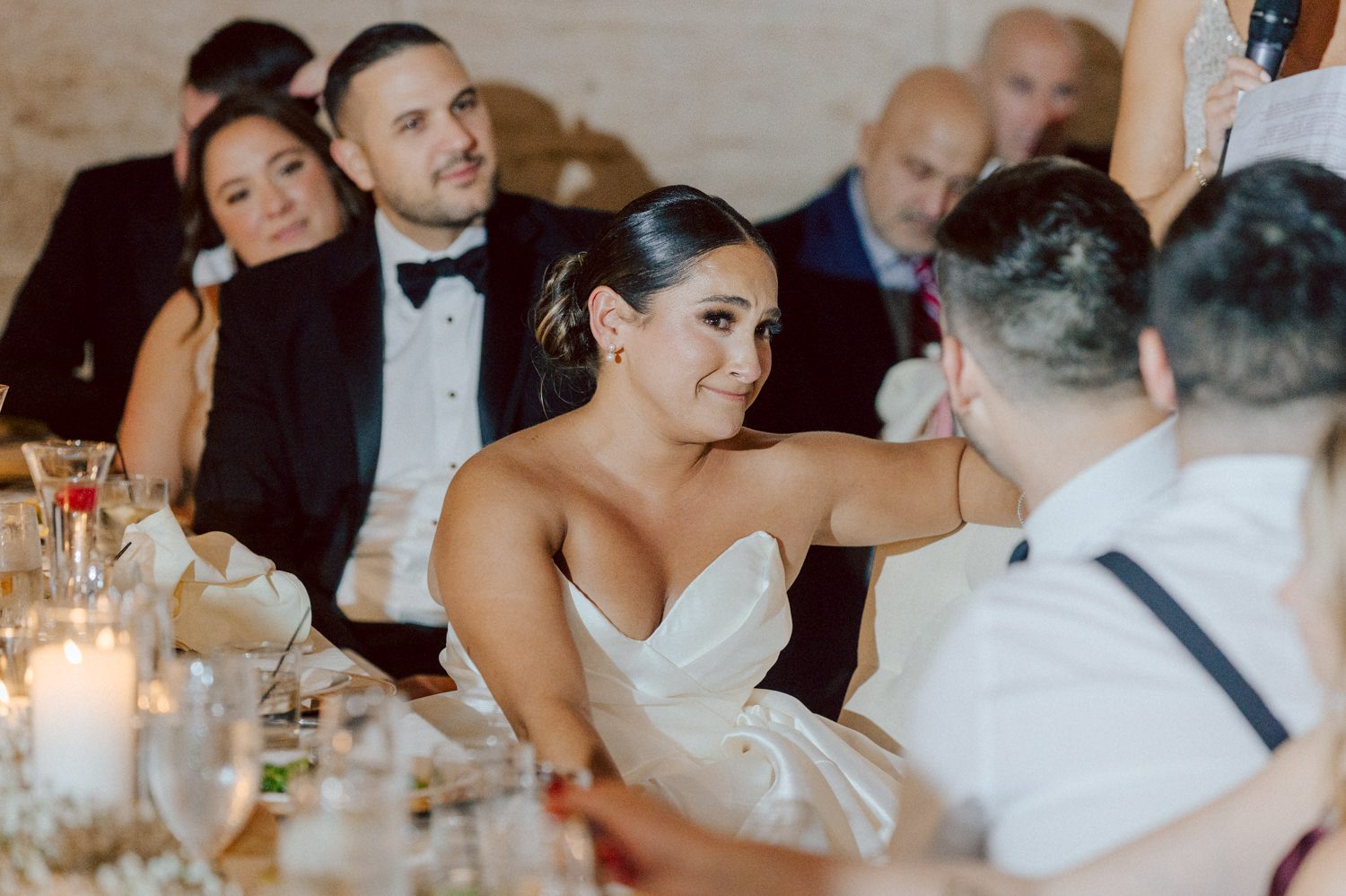 Bianca and Mike's The Union Trust Philadelphia wedding. I met Bianca and Mike at Julie and Thomas's wedding in 2021, Bianca was Julie's bridesmaid and best friend. Bianca and Mike new to book me for their wedding so as soon as they found their dream wedding venue The Union Trust in Philadelphia they emailed me. Honestly these previous couple's referrals are the best because they've already seen me work, familiar with my work and they are my true fans. Bianca got ready onsite at The Union Trust's bridal suit where the lighting was bit wonky with no natural light but hey I make it work! While Bianca was busy getting ready Mike and his buddies were over at Renaissance Hotel Philadelphia. Bianca and Mike also opted out of First Look, Bianca walking down the aisle at St. Augustine’s Philadelphia was when the couple saw each other for the first time and of course their eyes got watery. Bianca and Mike rang the wedding bell at St. Augustine’s Philadelphia and screamed with their arms raised as they exited St. Augustine as husband and wife. It was 4 in the afternoon, everyone loaded on the party bus we drove straight to historic Merchant Exchange Building Philadelphia for photos. The light, the weather was perfect, and surrounded by great people we wrapped up all our formal wedding portraits and now only word PARTY was on everyone's mind including the newly wed Bianca and Mike. Back at The Union Trust Ballroom, florists were busy decorating and entertainment crew was setting up. Together they turned this gorgeous Union Trust Ballroom, into chick and modern vibe. Bianca and Mike entered the ballroom and it was ON for the rest of the evening with party people filling the dance floor at The Union Trust, happily celebrating the union of their favorite people Bianca and Mike. Bianca and Mike's The Union Trust Philadelphia wedding photographed and documented by by Karis | Hey Karis | Catskills, Hudson Valley NY elopement and wedding photographer | Brooklyn NY elopement and wedding photographer | Manhattan NY elopement and wedding photographer | Hey Karis is fun documentary wedding and elopement photographer.