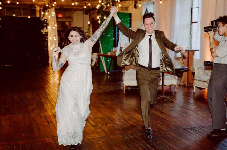 Nestled in the heart of Paterson, New Jersey, The Art Factory stands out as a unique and captivating wedding venue. This expansive warehouse-turned-loft space, with its exposed brick walls and soaring ceilings, serves as a canvas for couples seeking a distinctive backdrop for their special day.

On the memorable evening of October 8, 2023, I had the privilege of capturing the union of Blair and Eric within the enchanting confines of The Art Factory. The choice of this venue perfectly mirrored the essence of Blair and Eric's artistic souls. As creators themselves, the raw, industrial aesthetic and creative atmosphere of The Art Factory resonated deeply with their vision for the celebration.

Blair and Eric, surrounded by a diverse congregation of fellow art enthusiasts, exchanged vows in a ceremony that seamlessly blended tradition with contemporary flair. The venue's unique charm set the stage for a wedding that was as visually stunning as it was heartfelt.

The exposed brick walls and high ceilings provided a rustic yet elegant backdrop, enhancing the vibrancy of every moment captured through my lens. The ambiance was alive with the energy of creativity, a fitting tribute to the artistic journey that Blair and Eric embarked upon together.

As the evening unfolded, it became evident that The Art Factory was not merely a venue; it was an extension of Blair and Eric's artistic expression. The celebration was a testament to their love, surrounded by an eclectic mix of family and friends who shared in their passion for creativity.

Blair and Eric's wedding at The Art Factory in Paterson, NJ, was a masterpiece of love, where every detail reflected the unique canvas of their relationship. It was an honor to document the union of two artists in a space that echoed the beauty of their shared journey.

In the end, The Art Factory not only bore witness to a wedding but also played a vital role in shaping an unforgettable chapter in Blair and Eric's artistic love story. The October evening marked not just a celebration of marriage but a fusion of art, love, and the beauty of creative souls coming together. Blair and Eric's Artsy Warehouse Loft NJ Wedding photographed and documented by by Karis | Hey Karis | Catskills, Hudson Valley NY elopement and wedding photographer | Brooklyn NY elopement and wedding photographer | Manhattan NY elopement and wedding photographer | Hey Karis is fun documentary wedding and elopement photographer.
