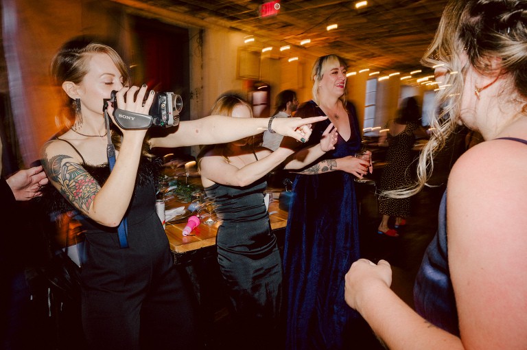 Nestled in the heart of Paterson, New Jersey, The Art Factory stands out as a unique and captivating wedding venue. This expansive warehouse-turned-loft space, with its exposed brick walls and soaring ceilings, serves as a canvas for couples seeking a distinctive backdrop for their special day.

On the memorable evening of October 8, 2023, I had the privilege of capturing the union of Blair and Eric within the enchanting confines of The Art Factory. The choice of this venue perfectly mirrored the essence of Blair and Eric's artistic souls. As creators themselves, the raw, industrial aesthetic and creative atmosphere of The Art Factory resonated deeply with their vision for the celebration.

Blair and Eric, surrounded by a diverse congregation of fellow art enthusiasts, exchanged vows in a ceremony that seamlessly blended tradition with contemporary flair. The venue's unique charm set the stage for a wedding that was as visually stunning as it was heartfelt.

The exposed brick walls and high ceilings provided a rustic yet elegant backdrop, enhancing the vibrancy of every moment captured through my lens. The ambiance was alive with the energy of creativity, a fitting tribute to the artistic journey that Blair and Eric embarked upon together.

As the evening unfolded, it became evident that The Art Factory was not merely a venue; it was an extension of Blair and Eric's artistic expression. The celebration was a testament to their love, surrounded by an eclectic mix of family and friends who shared in their passion for creativity.

Blair and Eric's wedding at The Art Factory in Paterson, NJ, was a masterpiece of love, where every detail reflected the unique canvas of their relationship. It was an honor to document the union of two artists in a space that echoed the beauty of their shared journey.

In the end, The Art Factory not only bore witness to a wedding but also played a vital role in shaping an unforgettable chapter in Blair and Eric's artistic love story. The October evening marked not just a celebration of marriage but a fusion of art, love, and the beauty of creative souls coming together. Blair and Eric's Artsy Warehouse Loft NJ Wedding photographed and documented by by Karis | Hey Karis | Catskills, Hudson Valley NY elopement and wedding photographer | Brooklyn NY elopement and wedding photographer | Manhattan NY elopement and wedding photographer | Hey Karis is fun documentary wedding and elopement photographer.
