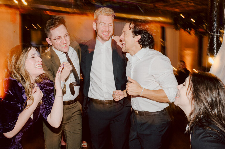 Nestled in the heart of Paterson, New Jersey, The Art Factory stands out as a unique and captivating wedding venue. This expansive warehouse-turned-loft space, with its exposed brick walls and soaring ceilings, serves as a canvas for couples seeking a distinctive backdrop for their special day.

On the memorable evening of October 8, 2023, I had the privilege of capturing the union of Blair and Eric within the enchanting confines of The Art Factory. The choice of this venue perfectly mirrored the essence of Blair and Eric's artistic souls. As creators themselves, the raw, industrial aesthetic and creative atmosphere of The Art Factory resonated deeply with their vision for the celebration.

Blair and Eric, surrounded by a diverse congregation of fellow art enthusiasts, exchanged vows in a ceremony that seamlessly blended tradition with contemporary flair. The venue's unique charm set the stage for a wedding that was as visually stunning as it was heartfelt.

The exposed brick walls and high ceilings provided a rustic yet elegant backdrop, enhancing the vibrancy of every moment captured through my lens. The ambiance was alive with the energy of creativity, a fitting tribute to the artistic journey that Blair and Eric embarked upon together.

As the evening unfolded, it became evident that The Art Factory was not merely a venue; it was an extension of Blair and Eric's artistic expression. The celebration was a testament to their love, surrounded by an eclectic mix of family and friends who shared in their passion for creativity.

Blair and Eric's wedding at The Art Factory in Paterson, NJ, was a masterpiece of love, where every detail reflected the unique canvas of their relationship. It was an honor to document the union of two artists in a space that echoed the beauty of their shared journey.

In the end, The Art Factory not only bore witness to a wedding but also played a vital role in shaping an unforgettable chapter in Blair and Eric's artistic love story. The October evening marked not just a celebration of marriage but a fusion of art, love, and the beauty of creative souls coming together. Blair and Eric's Artsy Warehouse Loft NJ Wedding photographed and documented by by Karis | Hey Karis | Catskills, Hudson Valley NY elopement and wedding photographer | Brooklyn NY elopement and wedding photographer | Manhattan NY elopement and wedding photographer | Hey Karis is fun documentary wedding and elopement photographer.
