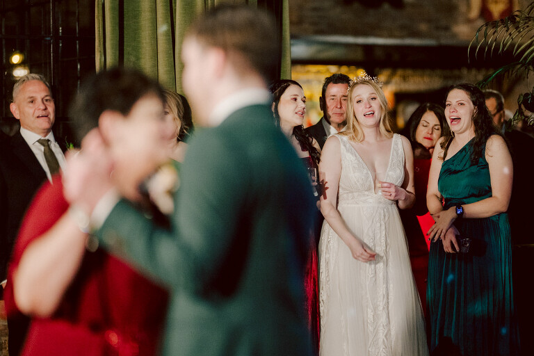 Just days before Halloween, on October 28th, Katie and Craig celebrated their enchanting wedding at the iconic Bowery Hotel in NYC. Having previously photographed an intimate wedding at The Bowery Hotel during the challenges of COVID in 2020, returning to capture the magic of Katie and Craig's celebration was a joyous experience.

The Bowery Hotel, a symbol of the "OLD New York," boasts a rich history intertwined with the stories of its residents. The Bowery Terrace, adorned in classic old-world style, features wood-beamed 13-foot ceilings, salvaged brick walls, Moroccan tiled floors, antique tapestries, an expansive outdoor terrace, and a captivating glazed fireplace. Described by the Huffington Post as a hidden gem with a relaxed and warming atmosphere, The Bowery Terrace served as the perfect backdrop for this magical occasion.

Katie and Craig began their day at The Bowery Hotel in a bridal suite with a terrace spacious enough to host a small wedding. It was on this vast terrace that they shared their first look, exchanging glances, conversations, and hugs. Their private moment culminated in the tender reading of their vows and letters to each other, setting the tone for a day filled with intimacy and love.

Following the intimate vow exchange, we ventured to Bond Street, where a magical bright yellow Ginkgo Tree awaited. The grounds beneath were adorned in a sea of yellow, a sight that perfectly aligned with Katie and Craig's shared love for nature and stars. The decision was unanimous, and we headed for the captivating Yellow Ginkgo Tree in the heart of Manhattan. With Bond Street serving as our backdrop, we captured stunning photos that reflected the essence of this unique couple.

Returning to The Bowery Hotel, families awaited their formal portraits with Katie and Craig. The Bowery Terrace came alive with wedding guests, artists, musicians, and beautiful New Yorkers, all eagerly anticipating the ceremony. As Katie walked down the aisle escorted by her parents, Craig's eyes welled with tears, encapsulating the emotional beauty of the moment.

The wedding ceremony, sweet and humorous, was officiated by their friend Michael Williams. Following the heartfelt exchange of vows, guests spilled out onto the outdoor terrace for a delightful cocktail hour. Meanwhile, the staff at The Bowery Hotel, alongside Planner Ani Wolff and her team, worked their magic, transforming the room into a spooky yet super chic version of "Harry Potter's Hogwarts Great Hall."

The remainder of Katie and Craig's wedding unfolded just as expected—fabulous and magical. The Bowery Hotel provided the perfect canvas for their love story, creating a celebration that will be cherished for years to come.
Katie and Craig's The Bowery Hotel, The Bowery Terrace wedding documented by by Karis | Hey Karis | Catskills, Hudson Valley NY elopement and wedding photographer | Brooklyn NY elopement and wedding photographer | Manhattan NY elopement and wedding photographer | Hey Karis is fun documentary wedding and elopement photographer.