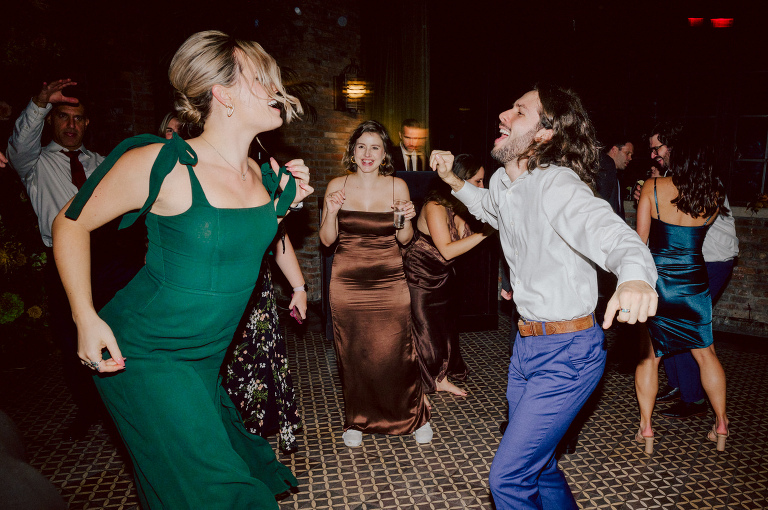 Just days before Halloween, on October 28th, Katie and Craig celebrated their enchanting wedding at the iconic Bowery Hotel in NYC. Having previously photographed an intimate wedding at The Bowery Hotel during the challenges of COVID in 2020, returning to capture the magic of Katie and Craig's celebration was a joyous experience.

The Bowery Hotel, a symbol of the "OLD New York," boasts a rich history intertwined with the stories of its residents. The Bowery Terrace, adorned in classic old-world style, features wood-beamed 13-foot ceilings, salvaged brick walls, Moroccan tiled floors, antique tapestries, an expansive outdoor terrace, and a captivating glazed fireplace. Described by the Huffington Post as a hidden gem with a relaxed and warming atmosphere, The Bowery Terrace served as the perfect backdrop for this magical occasion.

Katie and Craig began their day at The Bowery Hotel in a bridal suite with a terrace spacious enough to host a small wedding. It was on this vast terrace that they shared their first look, exchanging glances, conversations, and hugs. Their private moment culminated in the tender reading of their vows and letters to each other, setting the tone for a day filled with intimacy and love.

Following the intimate vow exchange, we ventured to Bond Street, where a magical bright yellow Ginkgo Tree awaited. The grounds beneath were adorned in a sea of yellow, a sight that perfectly aligned with Katie and Craig's shared love for nature and stars. The decision was unanimous, and we headed for the captivating Yellow Ginkgo Tree in the heart of Manhattan. With Bond Street serving as our backdrop, we captured stunning photos that reflected the essence of this unique couple.

Returning to The Bowery Hotel, families awaited their formal portraits with Katie and Craig. The Bowery Terrace came alive with wedding guests, artists, musicians, and beautiful New Yorkers, all eagerly anticipating the ceremony. As Katie walked down the aisle escorted by her parents, Craig's eyes welled with tears, encapsulating the emotional beauty of the moment.

The wedding ceremony, sweet and humorous, was officiated by their friend Michael Williams. Following the heartfelt exchange of vows, guests spilled out onto the outdoor terrace for a delightful cocktail hour. Meanwhile, the staff at The Bowery Hotel, alongside Planner Ani Wolff and her team, worked their magic, transforming the room into a spooky yet super chic version of "Harry Potter's Hogwarts Great Hall."

The remainder of Katie and Craig's wedding unfolded just as expected—fabulous and magical. The Bowery Hotel provided the perfect canvas for their love story, creating a celebration that will be cherished for years to come.
Katie and Craig's The Bowery Hotel, The Bowery Terrace wedding documented by by Karis | Hey Karis | Catskills, Hudson Valley NY elopement and wedding photographer | Brooklyn NY elopement and wedding photographer | Manhattan NY elopement and wedding photographer | Hey Karis is fun documentary wedding and elopement photographer.