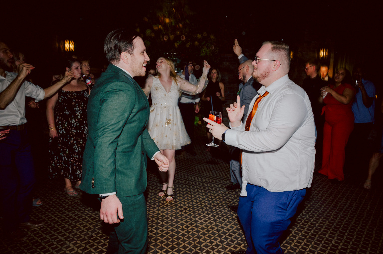 Just days before Halloween, on October 28th, Katie and Craig celebrated their enchanting wedding at the iconic Bowery Hotel in NYC. Having previously photographed an intimate wedding at The Bowery Hotel during the challenges of COVID in 2020, returning to capture the magic of Katie and Craig's celebration was a joyous experience.

The Bowery Hotel, a symbol of the "OLD New York," boasts a rich history intertwined with the stories of its residents. The Bowery Terrace, adorned in classic old-world style, features wood-beamed 13-foot ceilings, salvaged brick walls, Moroccan tiled floors, antique tapestries, an expansive outdoor terrace, and a captivating glazed fireplace. Described by the Huffington Post as a hidden gem with a relaxed and warming atmosphere, The Bowery Terrace served as the perfect backdrop for this magical occasion.

Katie and Craig began their day at The Bowery Hotel in a bridal suite with a terrace spacious enough to host a small wedding. It was on this vast terrace that they shared their first look, exchanging glances, conversations, and hugs. Their private moment culminated in the tender reading of their vows and letters to each other, setting the tone for a day filled with intimacy and love.

Following the intimate vow exchange, we ventured to Bond Street, where a magical bright yellow Ginkgo Tree awaited. The grounds beneath were adorned in a sea of yellow, a sight that perfectly aligned with Katie and Craig's shared love for nature and stars. The decision was unanimous, and we headed for the captivating Yellow Ginkgo Tree in the heart of Manhattan. With Bond Street serving as our backdrop, we captured stunning photos that reflected the essence of this unique couple.

Returning to The Bowery Hotel, families awaited their formal portraits with Katie and Craig. The Bowery Terrace came alive with wedding guests, artists, musicians, and beautiful New Yorkers, all eagerly anticipating the ceremony. As Katie walked down the aisle escorted by her parents, Craig's eyes welled with tears, encapsulating the emotional beauty of the moment.

The wedding ceremony, sweet and humorous, was officiated by their friend Michael Williams. Following the heartfelt exchange of vows, guests spilled out onto the outdoor terrace for a delightful cocktail hour. Meanwhile, the staff at The Bowery Hotel, alongside Planner Ani Wolff and her team, worked their magic, transforming the room into a spooky yet super chic version of "Harry Potter's Hogwarts Great Hall."

The remainder of Katie and Craig's wedding unfolded just as expected—fabulous and magical. The Bowery Hotel provided the perfect canvas for their love story, creating a celebration that will be cherished for years to come.
Katie and Craig's The Bowery Hotel, The Bowery Terrace wedding documented by by Karis | Hey Karis | Catskills, Hudson Valley NY elopement and wedding photographer | Brooklyn NY elopement and wedding photographer | Manhattan NY elopement and wedding photographer | Hey Karis is fun documentary wedding and elopement photographer.