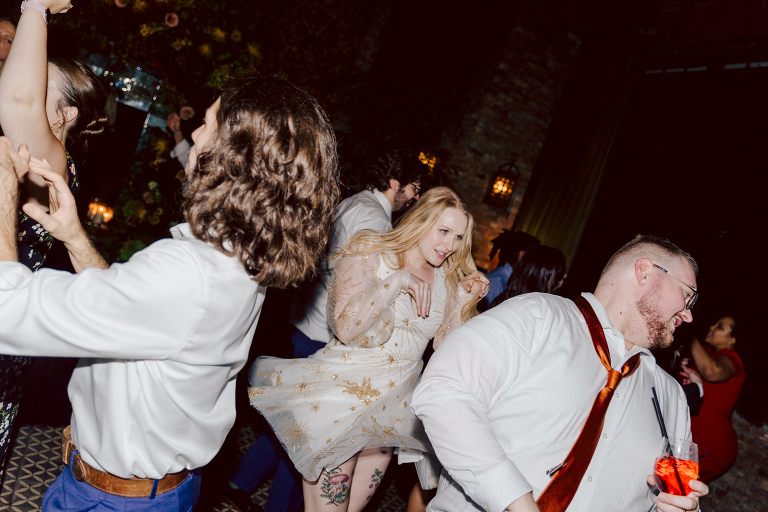 Just days before Halloween, on October 28th, Katie and Craig celebrated their enchanting wedding at the iconic Bowery Hotel in NYC. Having previously photographed an intimate wedding at The Bowery Hotel during the challenges of COVID in 2020, returning to capture the magic of Katie and Craig's celebration was a joyous experience.

The Bowery Hotel, a symbol of the "OLD New York," boasts a rich history intertwined with the stories of its residents. The Bowery Terrace, adorned in classic old-world style, features wood-beamed 13-foot ceilings, salvaged brick walls, Moroccan tiled floors, antique tapestries, an expansive outdoor terrace, and a captivating glazed fireplace. Described by the Huffington Post as a hidden gem with a relaxed and warming atmosphere, The Bowery Terrace served as the perfect backdrop for this magical occasion.

Katie and Craig began their day at The Bowery Hotel in a bridal suite with a terrace spacious enough to host a small wedding. It was on this vast terrace that they shared their first look, exchanging glances, conversations, and hugs. Their private moment culminated in the tender reading of their vows and letters to each other, setting the tone for a day filled with intimacy and love.

Following the intimate vow exchange, we ventured to Bond Street, where a magical bright yellow Ginkgo Tree awaited. The grounds beneath were adorned in a sea of yellow, a sight that perfectly aligned with Katie and Craig's shared love for nature and stars. The decision was unanimous, and we headed for the captivating Yellow Ginkgo Tree in the heart of Manhattan. With Bond Street serving as our backdrop, we captured stunning photos that reflected the essence of this unique couple.

Returning to The Bowery Hotel, families awaited their formal portraits with Katie and Craig. The Bowery Terrace came alive with wedding guests, artists, musicians, and beautiful New Yorkers, all eagerly anticipating the ceremony. As Katie walked down the aisle escorted by her parents, Craig's eyes welled with tears, encapsulating the emotional beauty of the moment.

The wedding ceremony, sweet and humorous, was officiated by their friend Michael Williams. Following the heartfelt exchange of vows, guests spilled out onto the outdoor terrace for a delightful cocktail hour. Meanwhile, the staff at The Bowery Hotel, alongside Planner Ani Wolff and her team, worked their magic, transforming the room into a spooky yet super chic version of "Harry Potter's Hogwarts Great Hall."

The remainder of Katie and Craig's wedding unfolded just as expected—fabulous and magical. The Bowery Hotel provided the perfect canvas for their love story, creating a celebration that will be cherished for years to come.
Katie and Craig's The Bowery Hotel, The Bowery Terrace wedding documented by by Karis | Hey Karis | Catskills, Hudson Valley NY elopement and wedding photographer | Brooklyn NY elopement and wedding photographer | Manhattan NY elopement and wedding photographer | Hey Karis is fun documentary wedding and elopement photographer.