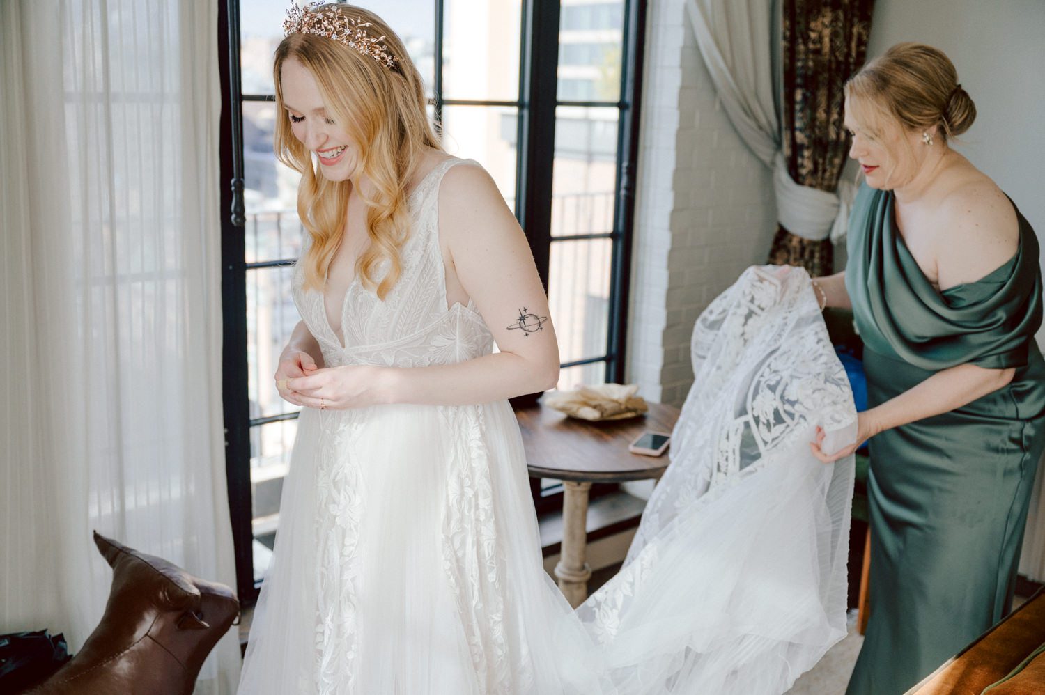 Just days before Halloween, on October 28th, Katie and Craig celebrated their enchanting wedding at the iconic Bowery Hotel in NYC. Having previously photographed an intimate wedding at The Bowery Hotel during the challenges of COVID in 2020, returning to capture the magic of Katie and Craig's celebration was a joyous experience.

The Bowery Hotel, a symbol of the "OLD New York," boasts a rich history intertwined with the stories of its residents. The Bowery Terrace, adorned in classic old-world style, features wood-beamed 13-foot ceilings, salvaged brick walls, Moroccan tiled floors, antique tapestries, an expansive outdoor terrace, and a captivating glazed fireplace. Described by the Huffington Post as a hidden gem with a relaxed and warming atmosphere, The Bowery Terrace served as the perfect backdrop for this magical occasion.

Katie and Craig began their day at The Bowery Hotel in a bridal suite with a terrace spacious enough to host a small wedding. It was on this vast terrace that they shared their first look, exchanging glances, conversations, and hugs. Their private moment culminated in the tender reading of their vows and letters to each other, setting the tone for a day filled with intimacy and love.

Following the intimate vow exchange, we ventured to Bond Street, where a magical bright yellow Ginkgo Tree awaited. The grounds beneath were adorned in a sea of yellow, a sight that perfectly aligned with Katie and Craig's shared love for nature and stars. The decision was unanimous, and we headed for the captivating Yellow Ginkgo Tree in the heart of Manhattan. With Bond Street serving as our backdrop, we captured stunning photos that reflected the essence of this unique couple.

Returning to The Bowery Hotel, families awaited their formal portraits with Katie and Craig. The Bowery Terrace came alive with wedding guests, artists, musicians, and beautiful New Yorkers, all eagerly anticipating the ceremony. As Katie walked down the aisle escorted by her parents, Craig's eyes welled with tears, encapsulating the emotional beauty of the moment.

The wedding ceremony, sweet and humorous, was officiated by their friend Michael Williams. Following the heartfelt exchange of vows, guests spilled out onto the outdoor terrace for a delightful cocktail hour. Meanwhile, the staff at The Bowery Hotel, alongside Planner Ani Wolff and her team, worked their magic, transforming the room into a spooky yet super chic version of "Harry Potter's Hogwarts Great Hall."

The remainder of Katie and Craig's wedding unfolded just as expected—fabulous and magical. The Bowery Hotel provided the perfect canvas for their love story, creating a celebration that will be cherished for years to come.
Katie and Craig's The Bowery Hotel, The Bowery Terrace wedding documented by by Karis | Hey Karis | Destination Wedding Photographer | Manhattan, Catskills, Hudson Valley, Brooklyn and NJ | Destination Elopement, Destination Wedding Photographer | Hey Karis is fun documentary wedding and elopement photographer based in NY, NJ.