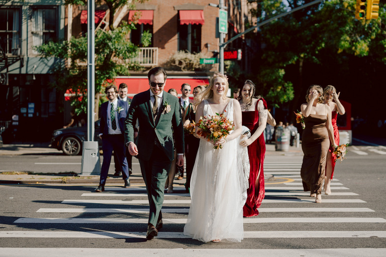 Just days before Halloween, on October 28th, Katie and Craig celebrated their enchanting wedding at the iconic Bowery Hotel in NYC. Having previously photographed an intimate wedding at The Bowery Hotel during the challenges of COVID in 2020, returning to capture the magic of Katie and Craig's celebration was a joyous experience.

The Bowery Hotel, a symbol of the "OLD New York," boasts a rich history intertwined with the stories of its residents. The Bowery Terrace, adorned in classic old-world style, features wood-beamed 13-foot ceilings, salvaged brick walls, Moroccan tiled floors, antique tapestries, an expansive outdoor terrace, and a captivating glazed fireplace. Described by the Huffington Post as a hidden gem with a relaxed and warming atmosphere, The Bowery Terrace served as the perfect backdrop for this magical occasion.

Katie and Craig began their day at The Bowery Hotel in a bridal suite with a terrace spacious enough to host a small wedding. It was on this vast terrace that they shared their first look, exchanging glances, conversations, and hugs. Their private moment culminated in the tender reading of their vows and letters to each other, setting the tone for a day filled with intimacy and love.

Following the intimate vow exchange, we ventured to Bond Street, where a magical bright yellow Ginkgo Tree awaited. The grounds beneath were adorned in a sea of yellow, a sight that perfectly aligned with Katie and Craig's shared love for nature and stars. The decision was unanimous, and we headed for the captivating Yellow Ginkgo Tree in the heart of Manhattan. With Bond Street serving as our backdrop, we captured stunning photos that reflected the essence of this unique couple.

Returning to The Bowery Hotel, families awaited their formal portraits with Katie and Craig. The Bowery Terrace came alive with wedding guests, artists, musicians, and beautiful New Yorkers, all eagerly anticipating the ceremony. As Katie walked down the aisle escorted by her parents, Craig's eyes welled with tears, encapsulating the emotional beauty of the moment.

The wedding ceremony, sweet and humorous, was officiated by their friend Michael Williams. Following the heartfelt exchange of vows, guests spilled out onto the outdoor terrace for a delightful cocktail hour. Meanwhile, the staff at The Bowery Hotel, alongside Planner Ani Wolff and her team, worked their magic, transforming the room into a spooky yet super chic version of "Harry Potter's Hogwarts Great Hall."

The remainder of Katie and Craig's wedding unfolded just as expected—fabulous and magical. The Bowery Hotel provided the perfect canvas for their love story, creating a celebration that will be cherished for years to come.
Katie and Craig's The Bowery Hotel, The Bowery Terrace wedding documented by by Karis | Hey Karis | Destination Wedding Photographer | Manhattan, Catskills, Hudson Valley, Brooklyn and NJ | Destination Elopement, Destination Wedding Photographer | Hey Karis is fun documentary wedding and elopement photographer based in NY, NJ.