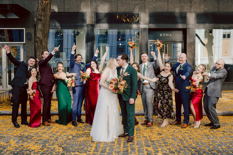 Just days before Halloween, on October 28th, Katie and Craig celebrated their enchanting wedding at the iconic Bowery Hotel in NYC. Having previously photographed an intimate wedding at The Bowery Hotel during the challenges of COVID in 2020, returning to capture the magic of Katie and Craig's celebration was a joyous experience.

The Bowery Hotel, a symbol of the "OLD New York," boasts a rich history intertwined with the stories of its residents. The Bowery Terrace, adorned in classic old-world style, features wood-beamed 13-foot ceilings, salvaged brick walls, Moroccan tiled floors, antique tapestries, an expansive outdoor terrace, and a captivating glazed fireplace. Described by the Huffington Post as a hidden gem with a relaxed and warming atmosphere, The Bowery Terrace served as the perfect backdrop for this magical occasion.

Katie and Craig began their day at The Bowery Hotel in a bridal suite with a terrace spacious enough to host a small wedding. It was on this vast terrace that they shared their first look, exchanging glances, conversations, and hugs. Their private moment culminated in the tender reading of their vows and letters to each other, setting the tone for a day filled with intimacy and love.

Following the intimate vow exchange, we ventured to Bond Street, where a magical bright yellow Ginkgo Tree awaited. The grounds beneath were adorned in a sea of yellow, a sight that perfectly aligned with Katie and Craig's shared love for nature and stars. The decision was unanimous, and we headed for the captivating Yellow Ginkgo Tree in the heart of Manhattan. With Bond Street serving as our backdrop, we captured stunning photos that reflected the essence of this unique couple.

Returning to The Bowery Hotel, families awaited their formal portraits with Katie and Craig. The Bowery Terrace came alive with wedding guests, artists, musicians, and beautiful New Yorkers, all eagerly anticipating the ceremony. As Katie walked down the aisle escorted by her parents, Craig's eyes welled with tears, encapsulating the emotional beauty of the moment.

The wedding ceremony, sweet and humorous, was officiated by their friend Michael Williams. Following the heartfelt exchange of vows, guests spilled out onto the outdoor terrace for a delightful cocktail hour. Meanwhile, the staff at The Bowery Hotel, alongside Planner Ani Wolff and her team, worked their magic, transforming the room into a spooky yet super chic version of "Harry Potter's Hogwarts Great Hall."

The remainder of Katie and Craig's wedding unfolded just as expected—fabulous and magical. The Bowery Hotel provided the perfect canvas for their love story, creating a celebration that will be cherished for years to come.
Katie and Craig's The Bowery Hotel, The Bowery Terrace wedding documented by by Karis | Hey Karis | Destination Wedding Photographer | Manhattan, Catskills, Hudson Valley, Brooklyn and NJ | Destination Elopement, Destination Wedding Photographer | Hey Karis is fun documentary wedding and elopement photographer based in NY, NJ.