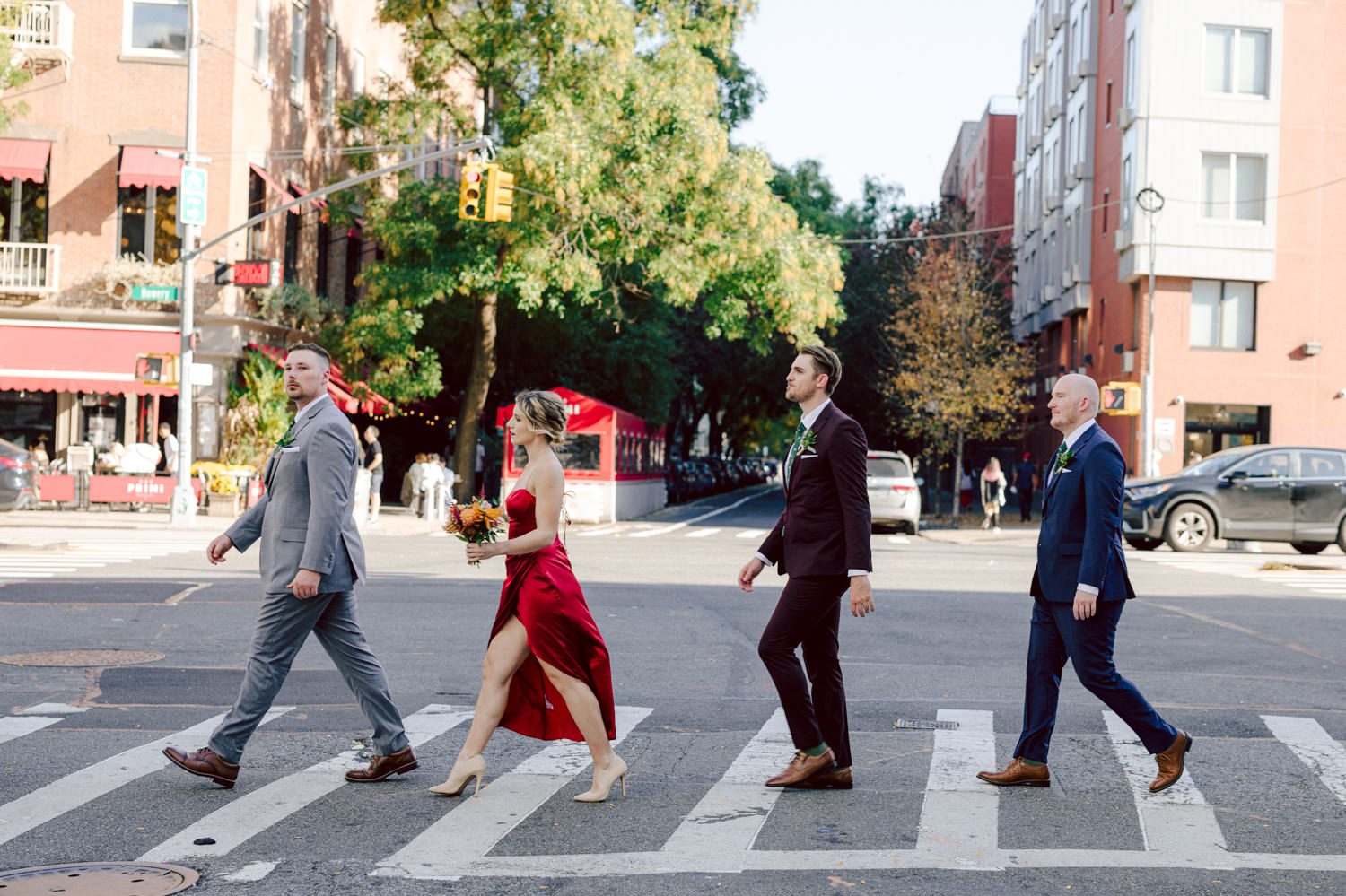Just days before Halloween, on October 28th, Katie and Craig celebrated their enchanting wedding at the iconic Bowery Hotel in NYC. Having previously photographed an intimate wedding at The Bowery Hotel during the challenges of COVID in 2020, returning to capture the magic of Katie and Craig's celebration was a joyous experience.

The Bowery Hotel, a symbol of the "OLD New York," boasts a rich history intertwined with the stories of its residents. The Bowery Terrace, adorned in classic old-world style, features wood-beamed 13-foot ceilings, salvaged brick walls, Moroccan tiled floors, antique tapestries, an expansive outdoor terrace, and a captivating glazed fireplace. Described by the Huffington Post as a hidden gem with a relaxed and warming atmosphere, The Bowery Terrace served as the perfect backdrop for this magical occasion.

Katie and Craig began their day at The Bowery Hotel in a bridal suite with a terrace spacious enough to host a small wedding. It was on this vast terrace that they shared their first look, exchanging glances, conversations, and hugs. Their private moment culminated in the tender reading of their vows and letters to each other, setting the tone for a day filled with intimacy and love.

Following the intimate vow exchange, we ventured to Bond Street, where a magical bright yellow Ginkgo Tree awaited. The grounds beneath were adorned in a sea of yellow, a sight that perfectly aligned with Katie and Craig's shared love for nature and stars. The decision was unanimous, and we headed for the captivating Yellow Ginkgo Tree in the heart of Manhattan. With Bond Street serving as our backdrop, we captured stunning photos that reflected the essence of this unique couple.

Returning to The Bowery Hotel, families awaited their formal portraits with Katie and Craig. The Bowery Terrace came alive with wedding guests, artists, musicians, and beautiful New Yorkers, all eagerly anticipating the ceremony. As Katie walked down the aisle escorted by her parents, Craig's eyes welled with tears, encapsulating the emotional beauty of the moment.

The wedding ceremony, sweet and humorous, was officiated by their friend Michael Williams. Following the heartfelt exchange of vows, guests spilled out onto the outdoor terrace for a delightful cocktail hour. Meanwhile, the staff at The Bowery Hotel, alongside Planner Ani Wolff and her team, worked their magic, transforming the room into a spooky yet super chic version of "Harry Potter's Hogwarts Great Hall."

The remainder of Katie and Craig's wedding unfolded just as expected—fabulous and magical. The Bowery Hotel provided the perfect canvas for their love story, creating a celebration that will be cherished for years to come.
Katie and Craig's The Bowery Hotel, The Bowery Terrace wedding documented by by Karis | Hey Karis | Destination Wedding Photographer | Manhattan, Catskills, Hudson Valley, Brooklyn and NJ | Destination Elopement, Destination Wedding Photographer | Hey Karis is fun documentary wedding and elopement photographer based in NY, NJ.