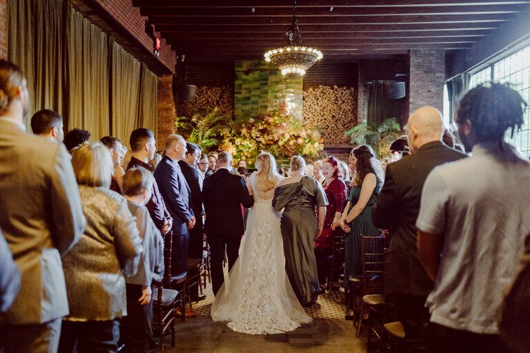 Just days before Halloween, on October 28th, Katie and Craig celebrated their enchanting wedding at the iconic Bowery Hotel in NYC. Having previously photographed an intimate wedding at The Bowery Hotel during the challenges of COVID in 2020, returning to capture the magic of Katie and Craig's celebration was a joyous experience.

The Bowery Hotel, a symbol of the "OLD New York," boasts a rich history intertwined with the stories of its residents. The Bowery Terrace, adorned in classic old-world style, features wood-beamed 13-foot ceilings, salvaged brick walls, Moroccan tiled floors, antique tapestries, an expansive outdoor terrace, and a captivating glazed fireplace. Described by the Huffington Post as a hidden gem with a relaxed and warming atmosphere, The Bowery Terrace served as the perfect backdrop for this magical occasion.

Katie and Craig began their day at The Bowery Hotel in a bridal suite with a terrace spacious enough to host a small wedding. It was on this vast terrace that they shared their first look, exchanging glances, conversations, and hugs. Their private moment culminated in the tender reading of their vows and letters to each other, setting the tone for a day filled with intimacy and love.

Following the intimate vow exchange, we ventured to Bond Street, where a magical bright yellow Ginkgo Tree awaited. The grounds beneath were adorned in a sea of yellow, a sight that perfectly aligned with Katie and Craig's shared love for nature and stars. The decision was unanimous, and we headed for the captivating Yellow Ginkgo Tree in the heart of Manhattan. With Bond Street serving as our backdrop, we captured stunning photos that reflected the essence of this unique couple.

Returning to The Bowery Hotel, families awaited their formal portraits with Katie and Craig. The Bowery Terrace came alive with wedding guests, artists, musicians, and beautiful New Yorkers, all eagerly anticipating the ceremony. As Katie walked down the aisle escorted by her parents, Craig's eyes welled with tears, encapsulating the emotional beauty of the moment.

The wedding ceremony, sweet and humorous, was officiated by their friend Michael Williams. Following the heartfelt exchange of vows, guests spilled out onto the outdoor terrace for a delightful cocktail hour. Meanwhile, the staff at The Bowery Hotel, alongside Planner Ani Wolff and her team, worked their magic, transforming the room into a spooky yet super chic version of "Harry Potter's Hogwarts Great Hall."

The remainder of Katie and Craig's wedding unfolded just as expected—fabulous and magical. The Bowery Hotel provided the perfect canvas for their love story, creating a celebration that will be cherished for years to come.
Katie and Craig's The Bowery Hotel, The Bowery Terrace wedding documented by by Karis | Hey Karis | Destination Wedding Photographer | Manhattan, Catskills, Hudson Valley, Brooklyn and NJ | Destination Elopement, Destination Wedding Photographer | Hey Karis is fun documentary wedding and elopement photographer based in NY, NJ.