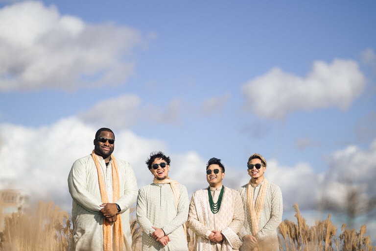 I first crossed paths with Xavier a few years back at Danny and Andy's wedding, where he stood as one of the groomsmen at The Ryland Inn in 2021. When Xavier and Priya's own wedding day approached, I was deeply honored that he remembered me and reached out to discuss capturing their special day.
Meeting Priya and Xavier together during their engagement session in Princeton, NJ was an essential part of my process. It allowed me to delve into their personalities and witness the beautiful chemistry they shared. Engagements sessions, for me, serve as a cornerstone in establishing a genuine connection with my couples before the main event.

Priya and Xavier both started the wedding day at the Hyatt Regency in Jersey City, a venue boasting panoramic views of the Hudson River and the iconic Manhattan skyline. Against this breathtaking backdrop, they readied themselves, shared a heartwarming first look along the Hudson River Waterfront Walkway, then shortly after Priya and Xavier's family and friends joined them for photos.
As Priya watched from a balcony, Xavier's Baraat procession unfolded below, a lively affair marked by music, drums, and joyous celebrations. Following the Baraat wedding guests ascended to the wedding ceremony room at the Hyatt Regency, where a beautifully adorned Mandap awaited their union.

The cocktail hour tantalized guests with an array of delicious Indian cuisine, setting the stage for the grand entrance into the candlelit reception hall. Priya and Xavier stepped in, resplendent in their evening attire, launching into their first dance. This was followed by the traditional Filipino money dance,

Throughout the evening, dance performances, heartfelt parent dances, and touching speeches filled the air with love and laughter. Priya and Xavier's faces radiated with pure joy, reflecting the love that enveloped them on their special day.

Priya and Xavier Hyatt Regency Jersey City NJ wedding documented by by Karis | Hey Karis | Destination Wedding Photographer | Manhattan, Catskills, Hudson Valley, Brooklyn and NJ | Destination Elopement, Destination Wedding Photographer | Hey Karis is fun documentary wedding and elopement photographer based in NY, NJ.