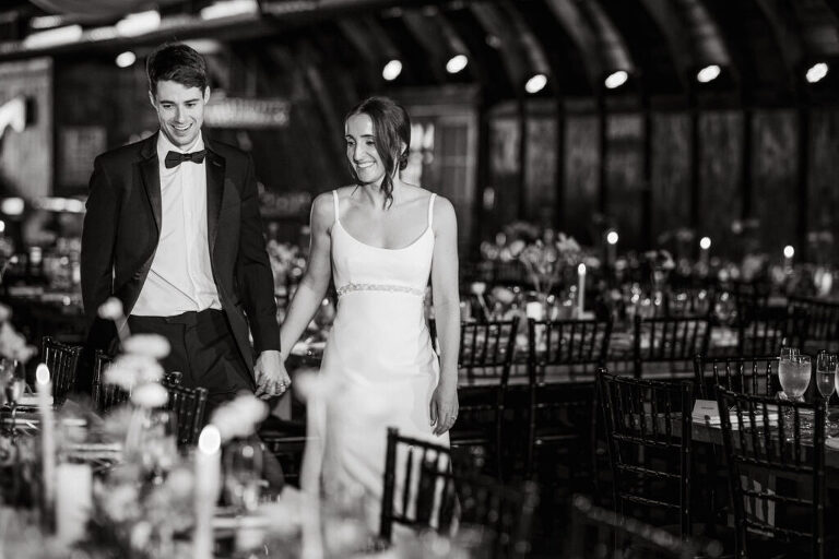 Malia and Aidan, currently residing in DC with their beloved pup Max, envisioned a wedding that reflected their laid-back, natural style. When we first chatted back in February 2023, they emphasized their desire for relaxed, fun, and candid photos that captured genuine moments.
Choosing The Barn at Perona Farms was a perfect fit for Malia and Aidan. Nestled amidst charming rustic surroundings and abundant nature, the venue complemented their preference for an authentic and unposed wedding day experience.
The ceremony took place outdoors on the lush lawn of The Barn at Perona Farms, exactly as they had envisioned – sweet, whimsy, and just the way they wanted it. Guests enjoyed a leisurely cocktail hour accompanied by live music courtesy of the talented Blue Label Band. The air was filled with the sounds of laughter and the clinking of wine glasses as everyone soaked in the joyful atmosphere.
As the evening progressed upstairs at The Barn, the ambiance was transformed by Moonlit Acres' stunning floral arrangements, candles, and elegant drapes. The space slowly filled with guests, reconnecting and sharing stories, delighted to be together again.
Then, the moment everyone had been waiting for: Malia and Aidan entered the room, surrounded by loved ones, and shared their first dance together.
Malia and Aidan's The Barn at Perona Farms NJ wedding documented by by Karis | Hey Karis | Destination Wedding Photographer | Manhattan, Catskills, Hudson Valley, Brooklyn and NJ | Destination Elopement, Destination Wedding Photographer | Hey Karis is fun documentary wedding and elopement photographer based in NY, NJ.