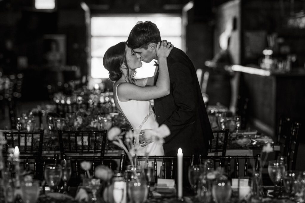 Malia and Aidan, currently residing in DC with their beloved pup Max, envisioned a wedding that reflected their laid-back, natural style. When we first chatted back in February 2023, they emphasized their desire for relaxed, fun, and candid photos that captured genuine moments. Choosing The Barn at Perona Farms was a perfect fit for Malia and Aidan. Nestled amidst charming rustic surroundings and abundant nature, the venue complemented their preference for an authentic and unposed wedding day experience. The ceremony took place outdoors on the lush lawn of The Barn at Perona Farms, exactly as they had envisioned – sweet, whimsy, and just the way they wanted it. Guests enjoyed a leisurely cocktail hour accompanied by live music courtesy of the talented Blue Label Band. The air was filled with the sounds of laughter and the clinking of wine glasses as everyone soaked in the joyful atmosphere. As the evening progressed upstairs at The Barn, the ambiance was transformed by Moonlit Acres' stunning floral arrangements, candles, and elegant drapes. The space slowly filled with guests, reconnecting and sharing stories, delighted to be together again. Then, the moment everyone had been waiting for: Malia and Aidan entered the room, surrounded by loved ones, and shared their first dance together. Malia and Aidan's The Barn at Perona Farms NJ wedding documented by by Karis | Hey Karis | Destination Wedding Photographer | Manhattan, Catskills, Hudson Valley, Brooklyn and NJ | Destination Elopement, Destination Wedding Photographer | Hey Karis is fun documentary wedding and elopement photographer based in NY, NJ.