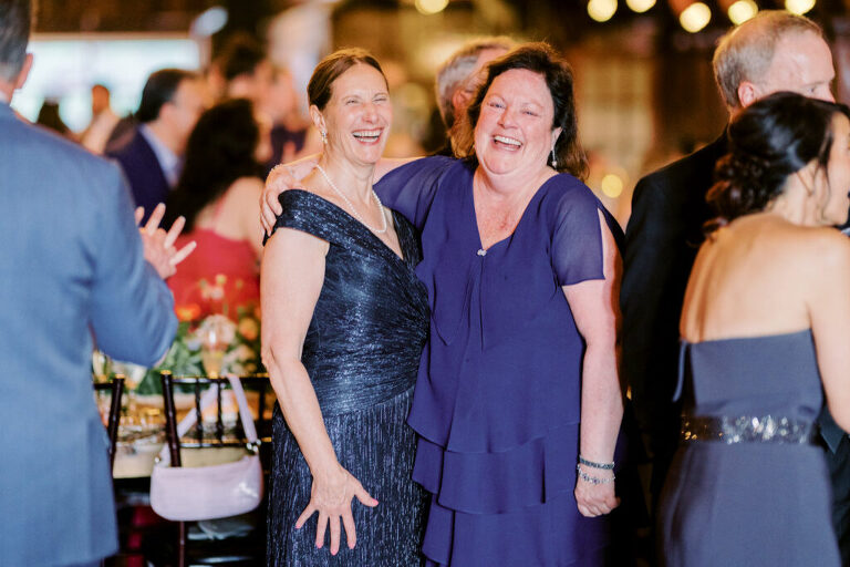 Malia and Aidan, currently residing in DC with their beloved pup Max, envisioned a wedding that reflected their laid-back, natural style. When we first chatted back in February 2023, they emphasized their desire for relaxed, fun, and candid photos that captured genuine moments.
Choosing The Barn at Perona Farms was a perfect fit for Malia and Aidan. Nestled amidst charming rustic surroundings and abundant nature, the venue complemented their preference for an authentic and unposed wedding day experience.
The ceremony took place outdoors on the lush lawn of The Barn at Perona Farms, exactly as they had envisioned – sweet, whimsy, and just the way they wanted it. Guests enjoyed a leisurely cocktail hour accompanied by live music courtesy of the talented Blue Label Band. The air was filled with the sounds of laughter and the clinking of wine glasses as everyone soaked in the joyful atmosphere.
As the evening progressed upstairs at The Barn, the ambiance was transformed by Moonlit Acres' stunning floral arrangements, candles, and elegant drapes. The space slowly filled with guests, reconnecting and sharing stories, delighted to be together again.
Then, the moment everyone had been waiting for: Malia and Aidan entered the room, surrounded by loved ones, and shared their first dance together.
Malia and Aidan's The Barn at Perona Farms NJ wedding documented by by Karis | Hey Karis | Destination Wedding Photographer | Manhattan, Catskills, Hudson Valley, Brooklyn and NJ | Destination Elopement, Destination Wedding Photographer | Hey Karis is fun documentary wedding and elopement photographer based in NY, NJ.