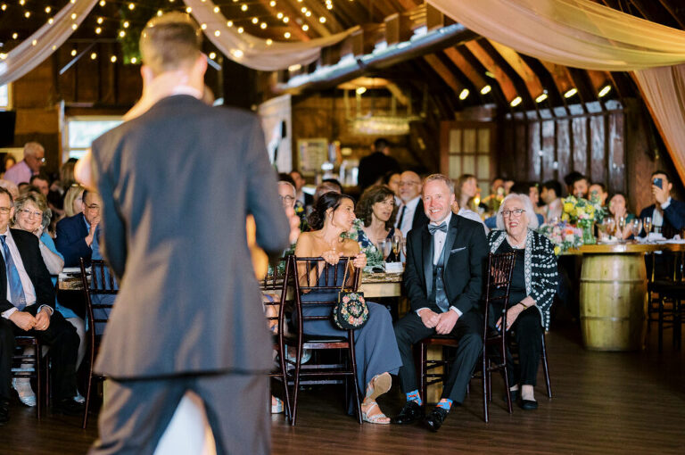 Malia and Aidan, currently residing in DC with their beloved pup Max, envisioned a wedding that reflected their laid-back, natural style. When we first chatted back in February 2023, they emphasized their desire for relaxed, fun, and candid photos that captured genuine moments.
Choosing The Barn at Perona Farms was a perfect fit for Malia and Aidan. Nestled amidst charming rustic surroundings and abundant nature, the venue complemented their preference for an authentic and unposed wedding day experience.
The ceremony took place outdoors on the lush lawn of The Barn at Perona Farms, exactly as they had envisioned – sweet, whimsy, and just the way they wanted it. Guests enjoyed a leisurely cocktail hour accompanied by live music courtesy of the talented Blue Label Band. The air was filled with the sounds of laughter and the clinking of wine glasses as everyone soaked in the joyful atmosphere.
As the evening progressed upstairs at The Barn, the ambiance was transformed by Moonlit Acres' stunning floral arrangements, candles, and elegant drapes. The space slowly filled with guests, reconnecting and sharing stories, delighted to be together again.
Then, the moment everyone had been waiting for: Malia and Aidan entered the room, surrounded by loved ones, and shared their first dance together.
Malia and Aidan's The Barn at Perona Farms NJ wedding documented by by Karis | Hey Karis | Destination Wedding Photographer | Manhattan, Catskills, Hudson Valley, Brooklyn and NJ | Destination Elopement, Destination Wedding Photographer | Hey Karis is fun documentary wedding and elopement photographer based in NY, NJ.