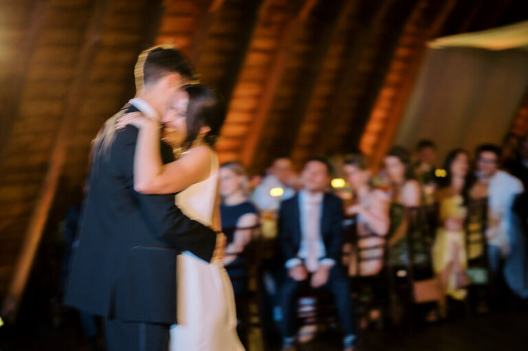 Malia and Aidan, currently residing in DC with their beloved pup Max, envisioned a wedding that reflected their laid-back, natural style. When we first chatted back in February 2023, they emphasized their desire for relaxed, fun, and candid photos that captured genuine moments.
Choosing The Barn at Perona Farms was a perfect fit for Malia and Aidan. Nestled amidst charming rustic surroundings and abundant nature, the venue complemented their preference for an authentic and unposed wedding day experience.
The ceremony took place outdoors on the lush lawn of The Barn at Perona Farms, exactly as they had envisioned – sweet, whimsy, and just the way they wanted it. Guests enjoyed a leisurely cocktail hour accompanied by live music courtesy of the talented Blue Label Band. The air was filled with the sounds of laughter and the clinking of wine glasses as everyone soaked in the joyful atmosphere.
As the evening progressed upstairs at The Barn, the ambiance was transformed by Moonlit Acres' stunning floral arrangements, candles, and elegant drapes. The space slowly filled with guests, reconnecting and sharing stories, delighted to be together again.
Then, the moment everyone had been waiting for: Malia and Aidan entered the room, surrounded by loved ones, and shared their first dance together.
Malia and Aidan's The Barn at Perona Farms NJ wedding documented by by Karis | Hey Karis | Destination Wedding Photographer | Manhattan, Catskills, Hudson Valley, Brooklyn and NJ | Destination Elopement, Destination Wedding Photographer | Hey Karis is fun documentary wedding and elopement photographer based in NY, NJ.