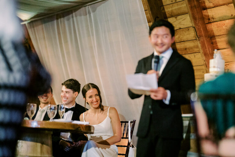 Malia and Aidan, currently residing in DC with their beloved pup Max, envisioned a wedding that reflected their laid-back, natural style. When we first chatted back in February 2023, they emphasized their desire for relaxed, fun, and candid photos that captured genuine moments.
Choosing The Barn at Perona Farms was a perfect fit for Malia and Aidan. Nestled amidst charming rustic surroundings and abundant nature, the venue complemented their preference for an authentic and unposed wedding day experience.
The ceremony took place outdoors on the lush lawn of The Barn at Perona Farms, exactly as they had envisioned – sweet, whimsy, and just the way they wanted it. Guests enjoyed a leisurely cocktail hour accompanied by live music courtesy of the talented Blue Label Band. The air was filled with the sounds of laughter and the clinking of wine glasses as everyone soaked in the joyful atmosphere.
As the evening progressed upstairs at The Barn, the ambiance was transformed by Moonlit Acres' stunning floral arrangements, candles, and elegant drapes. The space slowly filled with guests, reconnecting and sharing stories, delighted to be together again.
Then, the moment everyone had been waiting for: Malia and Aidan entered the room, surrounded by loved ones, and shared their first dance together.
Malia and Aidan's The Barn at Perona Farms NJ wedding documented by by Karis | Hey Karis | Destination Wedding Photographer | Manhattan, Catskills, Hudson Valley, Brooklyn and NJ | Destination Elopement, Destination Wedding Photographer | Hey Karis is fun documentary wedding and elopement photographer based in NY, NJ.