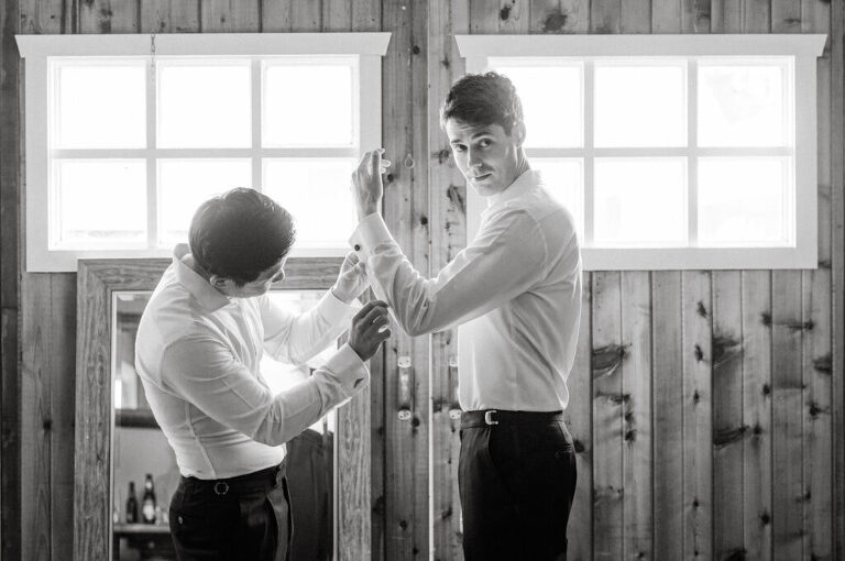 Malia and Aidan, currently residing in DC with their beloved pup Max, envisioned a wedding that reflected their laid-back, natural style. When we first chatted back in February 2023, they emphasized their desire for relaxed, fun, and candid photos that captured genuine moments.
Choosing The Barn at Perona Farms was a perfect fit for Malia and Aidan. Nestled amidst charming rustic surroundings and abundant nature, the venue complemented their preference for an authentic and unposed wedding day experience.
The ceremony took place outdoors on the lush lawn of The Barn at Perona Farms, exactly as they had envisioned – sweet, whimsy, and just the way they wanted it. Guests enjoyed a leisurely cocktail hour accompanied by live music courtesy of the talented Blue Label Band. The air was filled with the sounds of laughter and the clinking of wine glasses as everyone soaked in the joyful atmosphere.
As the evening progressed upstairs at The Barn, the ambiance was transformed by Moonlit Acres' stunning floral arrangements, candles, and elegant drapes. The space slowly filled with guests, reconnecting and sharing stories, delighted to be together again.
Then, the moment everyone had been waiting for: Malia and Aidan entered the room, surrounded by loved ones, and shared their first dance together.
Malia and Aidan's The Barn at Perona Farms NJ wedding documented by by Karis | Hey Karis | Destination Wedding Photographer | Manhattan, Catskills, Hudson Valley, Brooklyn and NJ | Destination Elopement, Destination Wedding Photographer | Hey Karis is fun documentary wedding and elopement photographer based in NY, NJ.