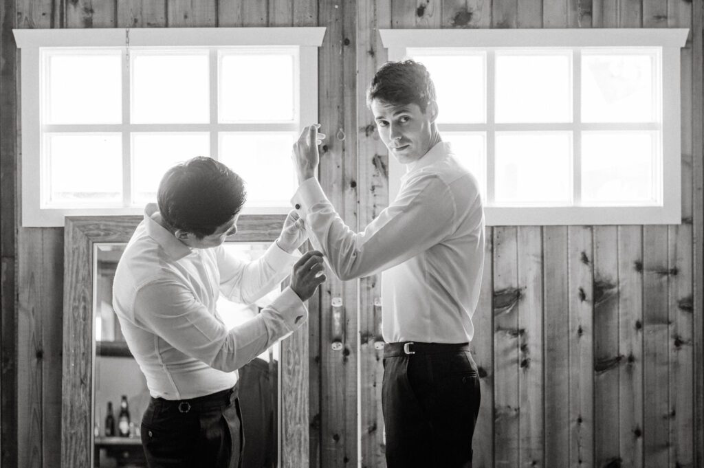 Malia and Aidan, currently residing in DC with their beloved pup Max, envisioned a wedding that reflected their laid-back, natural style. When we first chatted back in February 2023, they emphasized their desire for relaxed, fun, and candid photos that captured genuine moments.
Choosing The Barn at Perona Farms was a perfect fit for Malia and Aidan. Nestled amidst charming rustic surroundings and abundant nature, the venue complemented their preference for an authentic and unposed wedding day experience.
The ceremony took place outdoors on the lush lawn of The Barn at Perona Farms, exactly as they had envisioned – sweet, whimsy, and just the way they wanted it. Guests enjoyed a leisurely cocktail hour accompanied by live music courtesy of the talented Blue Label Band. The air was filled with the sounds of laughter and the clinking of wine glasses as everyone soaked in the joyful atmosphere.
As the evening progressed upstairs at The Barn, the ambiance was transformed by Moonlit Acres' stunning floral arrangements, candles, and elegant drapes. The space slowly filled with guests, reconnecting and sharing stories, delighted to be together again.
Then, the moment everyone had been waiting for: Malia and Aidan entered the room, surrounded by loved ones, and shared their first dance together.
Malia and Aidan's The Barn at Perona Farms NJ wedding documented by by Karis | Hey Karis | Destination Wedding Photographer | Manhattan, Catskills, Hudson Valley, Brooklyn and NJ | Destination Elopement, Destination Wedding Photographer | Hey Karis is fun documentary wedding and elopement photographer based in NY, NJ.