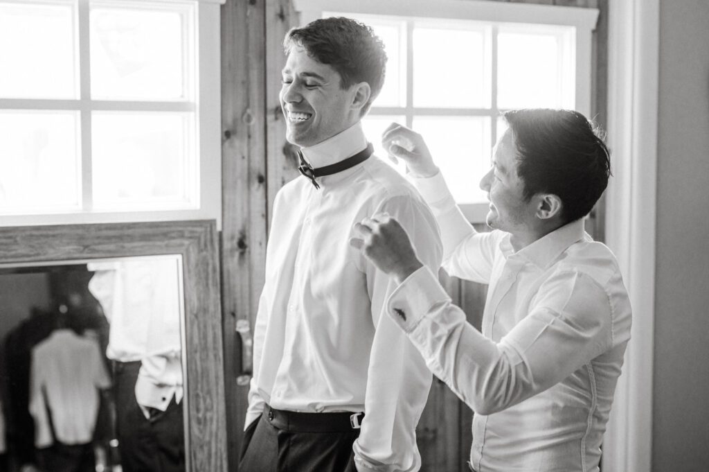 Malia and Aidan, currently residing in DC with their beloved pup Max, envisioned a wedding that reflected their laid-back, natural style. When we first chatted back in February 2023, they emphasized their desire for relaxed, fun, and candid photos that captured genuine moments.
Choosing The Barn at Perona Farms was a perfect fit for Malia and Aidan. Nestled amidst charming rustic surroundings and abundant nature, the venue complemented their preference for an authentic and unposed wedding day experience.
The ceremony took place outdoors on the lush lawn of The Barn at Perona Farms, exactly as they had envisioned – sweet, whimsy, and just the way they wanted it. Guests enjoyed a leisurely cocktail hour accompanied by live music courtesy of the talented Blue Label Band. The air was filled with the sounds of laughter and the clinking of wine glasses as everyone soaked in the joyful atmosphere.
As the evening progressed upstairs at The Barn, the ambiance was transformed by Moonlit Acres' stunning floral arrangements, candles, and elegant drapes. The space slowly filled with guests, reconnecting and sharing stories, delighted to be together again.
Then, the moment everyone had been waiting for: Malia and Aidan entered the room, surrounded by loved ones, and shared their first dance together.
Malia and Aidan's The Barn at Perona Farms NJ wedding documented by by Karis | Hey Karis | Destination Wedding Photographer | Manhattan, Catskills, Hudson Valley, Brooklyn and NJ | Destination Elopement, Destination Wedding Photographer | Hey Karis is fun documentary wedding and elopement photographer based in NY, NJ.