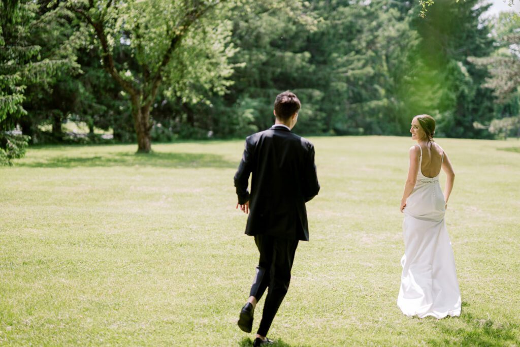 Malia and Aidan, currently residing in DC with their beloved pup Max, envisioned a wedding that reflected their laid-back, natural style. When we first chatted back in February 2023, they emphasized their desire for relaxed, fun, and candid photos that captured genuine moments.
Choosing The Barn at Perona Farms was a perfect fit for Malia and Aidan. Nestled amidst charming rustic surroundings and abundant nature, the venue complemented their preference for an authentic and unposed wedding day experience.
The ceremony took place outdoors on the lush lawn of The Barn at Perona Farms, exactly as they had envisioned – sweet, whimsy, and just the way they wanted it. Guests enjoyed a leisurely cocktail hour accompanied by live music courtesy of the talented Blue Label Band. The air was filled with the sounds of laughter and the clinking of wine glasses as everyone soaked in the joyful atmosphere.
As the evening progressed upstairs at The Barn, the ambiance was transformed by Moonlit Acres' stunning floral arrangements, candles, and elegant drapes. The space slowly filled with guests, reconnecting and sharing stories, delighted to be together again.
Then, the moment everyone had been waiting for: Malia and Aidan entered the room, surrounded by loved ones, and shared their first dance together.
Malia and Aidan's The Barn at Perona Farms NJ wedding documented by by Karis | Hey Karis | Destination Wedding Photographer | Manhattan, Catskills, Hudson Valley, Brooklyn and NJ | Destination Elopement, Destination Wedding Photographer | Hey Karis is fun documentary wedding and elopement photographer based in NY, NJ.