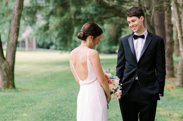 Malia and Aidan, currently residing in DC with their beloved pup Max, envisioned a wedding that reflected their laid-back, natural style. When we first chatted back in February 2023, they emphasized their desire for relaxed, fun, and candid photos that captured genuine moments.
Choosing The Barn at Perona Farms was a perfect fit for Malia and Aidan. Nestled amidst charming rustic surroundings and abundant nature, the venue complemented their preference for an authentic and unposed wedding day experience.
The ceremony took place outdoors on the lush lawn of The Barn at Perona Farms, exactly as they had envisioned – sweet, whimsy, and just the way they wanted it. Guests enjoyed a leisurely cocktail hour accompanied by live music courtesy of the talented Blue Label Band. The air was filled with the sounds of laughter and the clinking of wine glasses as everyone soaked in the joyful atmosphere.
As the evening progressed upstairs at The Barn, the ambiance was transformed by Moonlit Acres' stunning floral arrangements, candles, and elegant drapes. The space slowly filled with guests, reconnecting and sharing stories, delighted to be together again.
Then, the moment everyone had been waiting for: Malia and Aidan entered the room, surrounded by loved ones, and shared their first dance together.
Malia and Aidan's The Barn at Perona Farms NJ wedding documented by by Karis | Hey Karis | Destination Wedding Photographer | Manhattan, Catskills, Hudson Valley, Brooklyn and NJ | Destination Elopement, Destination Wedding Photographer | Hey Karis is fun documentary wedding and elopement photographer based in NY, NJ.