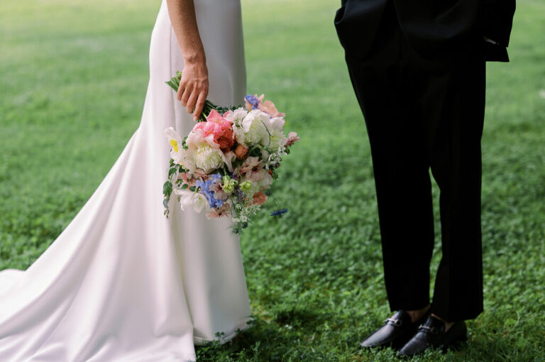 Malia and Aidan, currently residing in DC with their beloved pup Max, envisioned a wedding that reflected their laid-back, natural style. When we first chatted back in February 2023, they emphasized their desire for relaxed, fun, and candid photos that captured genuine moments.
Choosing The Barn at Perona Farms was a perfect fit for Malia and Aidan. Nestled amidst charming rustic surroundings and abundant nature, the venue complemented their preference for an authentic and unposed wedding day experience.
The ceremony took place outdoors on the lush lawn of The Barn at Perona Farms, exactly as they had envisioned – sweet, whimsy, and just the way they wanted it. Guests enjoyed a leisurely cocktail hour accompanied by live music courtesy of the talented Blue Label Band. The air was filled with the sounds of laughter and the clinking of wine glasses as everyone soaked in the joyful atmosphere.
As the evening progressed upstairs at The Barn, the ambiance was transformed by Moonlit Acres' stunning floral arrangements, candles, and elegant drapes. The space slowly filled with guests, reconnecting and sharing stories, delighted to be together again.
Then, the moment everyone had been waiting for: Malia and Aidan entered the room, surrounded by loved ones, and shared their first dance together.
Malia and Aidan's The Barn at Perona Farms NJ wedding documented by by Karis | Hey Karis | Destination Wedding Photographer | Manhattan, Catskills, Hudson Valley, Brooklyn and NJ | Destination Elopement, Destination Wedding Photographer | Hey Karis is fun documentary wedding and elopement photographer based in NY, NJ.