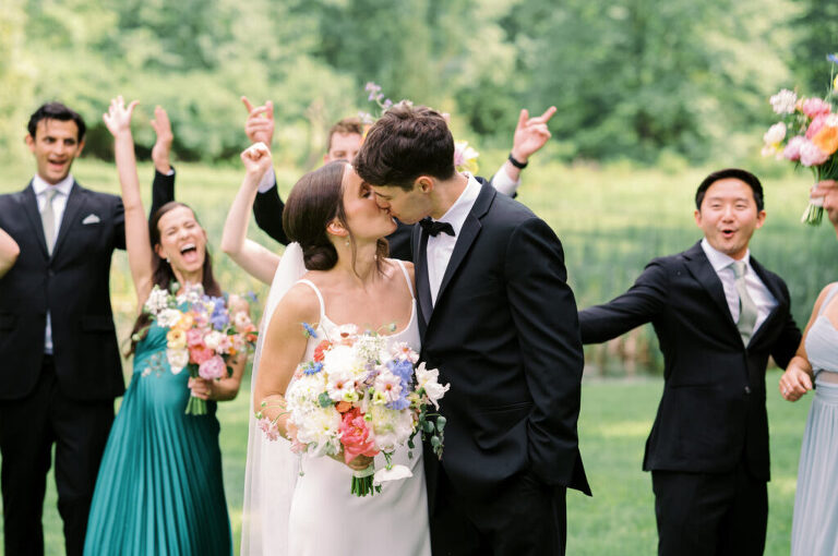 Malia and Aidan, currently residing in DC with their beloved pup Max, envisioned a wedding that reflected their laid-back, natural style. When we first chatted back in February 2023, they emphasized their desire for relaxed, fun, and candid photos that captured genuine moments.
Choosing The Barn at Perona Farms was a perfect fit for Malia and Aidan. Nestled amidst charming rustic surroundings and abundant nature, the venue complemented their preference for an authentic and unposed wedding day experience.
The ceremony took place outdoors on the lush lawn of The Barn at Perona Farms, exactly as they had envisioned – sweet, whimsy, and just the way they wanted it. Guests enjoyed a leisurely cocktail hour accompanied by live music courtesy of the talented Blue Label Band. The air was filled with the sounds of laughter and the clinking of wine glasses as everyone soaked in the joyful atmosphere.
As the evening progressed upstairs at The Barn, the ambiance was transformed by Moonlit Acres' stunning floral arrangements, candles, and elegant drapes. The space slowly filled with guests, reconnecting and sharing stories, delighted to be together again.
Then, the moment everyone had been waiting for: Malia and Aidan entered the room, surrounded by loved ones, and shared their first dance together.
Malia and Aidan's The Barn at Perona Farms NJ wedding documented by by Karis | Hey Karis | Destination Wedding Photographer | Manhattan, Catskills, Hudson Valley, Brooklyn and NJ | Destination Elopement, Destination Wedding Photographer | Hey Karis is fun documentary wedding and elopement photographer based in NY, NJ.