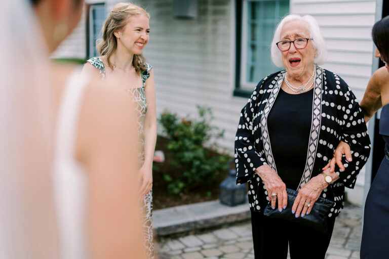 Malia and Aidan, currently residing in DC with their beloved pup Max, envisioned a wedding that reflected their laid-back, natural style. When we first chatted back in February 2023, they emphasized their desire for relaxed, fun, and candid photos that captured genuine moments.
Choosing The Barn at Perona Farms was a perfect fit for Malia and Aidan. Nestled amidst charming rustic surroundings and abundant nature, the venue complemented their preference for an authentic and unposed wedding day experience.
The ceremony took place outdoors on the lush lawn of The Barn at Perona Farms, exactly as they had envisioned – sweet, whimsy, and just the way they wanted it. Guests enjoyed a leisurely cocktail hour accompanied by live music courtesy of the talented Blue Label Band. The air was filled with the sounds of laughter and the clinking of wine glasses as everyone soaked in the joyful atmosphere.
As the evening progressed upstairs at The Barn, the ambiance was transformed by Moonlit Acres' stunning floral arrangements, candles, and elegant drapes. The space slowly filled with guests, reconnecting and sharing stories, delighted to be together again.
Then, the moment everyone had been waiting for: Malia and Aidan entered the room, surrounded by loved ones, and shared their first dance together.
Malia and Aidan's The Barn at Perona Farms NJ wedding documented by by Karis | Hey Karis | Destination Wedding Photographer | Manhattan, Catskills, Hudson Valley, Brooklyn and NJ | Destination Elopement, Destination Wedding Photographer | Hey Karis is fun documentary wedding and elopement photographer based in NY, NJ.