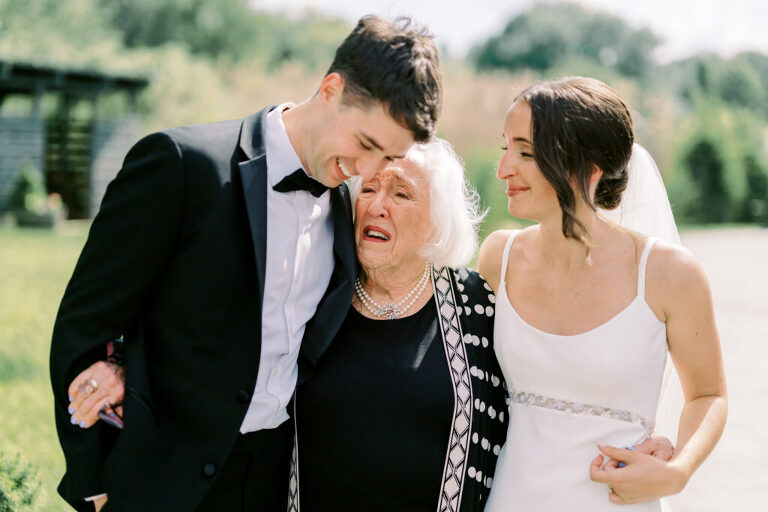 Malia and Aidan, currently residing in DC with their beloved pup Max, envisioned a wedding that reflected their laid-back, natural style. When we first chatted back in February 2023, they emphasized their desire for relaxed, fun, and candid photos that captured genuine moments.
Choosing The Barn at Perona Farms was a perfect fit for Malia and Aidan. Nestled amidst charming rustic surroundings and abundant nature, the venue complemented their preference for an authentic and unposed wedding day experience.
The ceremony took place outdoors on the lush lawn of The Barn at Perona Farms, exactly as they had envisioned – sweet, whimsy, and just the way they wanted it. Guests enjoyed a leisurely cocktail hour accompanied by live music courtesy of the talented Blue Label Band. The air was filled with the sounds of laughter and the clinking of wine glasses as everyone soaked in the joyful atmosphere.
As the evening progressed upstairs at The Barn, the ambiance was transformed by Moonlit Acres' stunning floral arrangements, candles, and elegant drapes. The space slowly filled with guests, reconnecting and sharing stories, delighted to be together again.
Then, the moment everyone had been waiting for: Malia and Aidan entered the room, surrounded by loved ones, and shared their first dance together.
Malia and Aidan's The Barn at Perona Farms NJ wedding documented by by Karis | Hey Karis | Destination Wedding Photographer | Manhattan, Catskills, Hudson Valley, Brooklyn and NJ | Destination Elopement, Destination Wedding Photographer | Hey Karis is fun documentary wedding and elopement photographer based in NY, NJ.