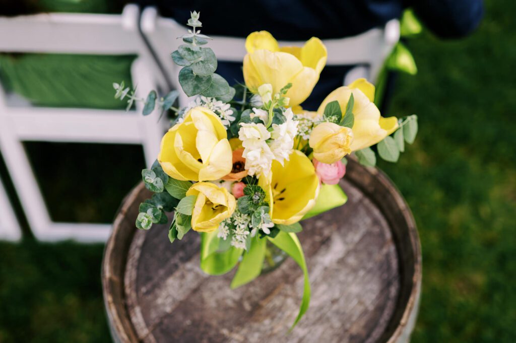 Malia and Aidan, currently residing in DC with their beloved pup Max, envisioned a wedding that reflected their laid-back, natural style. When we first chatted back in February 2023, they emphasized their desire for relaxed, fun, and candid photos that captured genuine moments.
Choosing The Barn at Perona Farms was a perfect fit for Malia and Aidan. Nestled amidst charming rustic surroundings and abundant nature, the venue complemented their preference for an authentic and unposed wedding day experience.
The ceremony took place outdoors on the lush lawn of The Barn at Perona Farms, exactly as they had envisioned – sweet, whimsy, and just the way they wanted it. Guests enjoyed a leisurely cocktail hour accompanied by live music courtesy of the talented Blue Label Band. The air was filled with the sounds of laughter and the clinking of wine glasses as everyone soaked in the joyful atmosphere.
As the evening progressed upstairs at The Barn, the ambiance was transformed by Moonlit Acres' stunning floral arrangements, candles, and elegant drapes. The space slowly filled with guests, reconnecting and sharing stories, delighted to be together again.
Then, the moment everyone had been waiting for: Malia and Aidan entered the room, surrounded by loved ones, and shared their first dance together.
Malia and Aidan's The Barn at Perona Farms NJ wedding documented by by Karis | Hey Karis | Destination Wedding Photographer | Manhattan, Catskills, Hudson Valley, Brooklyn and NJ | Destination Elopement, Destination Wedding Photographer | Hey Karis is fun documentary wedding and elopement photographer based in NY, NJ.