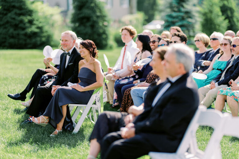 Malia and Aidan, currently residing in DC with their beloved pup Max, envisioned a wedding that reflected their laid-back, natural style. When we first chatted back in February 2023, they emphasized their desire for relaxed, fun, and candid photos that captured genuine moments.
Choosing The Barn at Perona Farms was a perfect fit for Malia and Aidan. Nestled amidst charming rustic surroundings and abundant nature, the venue complemented their preference for an authentic and unposed wedding day experience.
The ceremony took place outdoors on the lush lawn of The Barn at Perona Farms, exactly as they had envisioned – sweet, whimsy, and just the way they wanted it. Guests enjoyed a leisurely cocktail hour accompanied by live music courtesy of the talented Blue Label Band. The air was filled with the sounds of laughter and the clinking of wine glasses as everyone soaked in the joyful atmosphere.
As the evening progressed upstairs at The Barn, the ambiance was transformed by Moonlit Acres' stunning floral arrangements, candles, and elegant drapes. The space slowly filled with guests, reconnecting and sharing stories, delighted to be together again.
Then, the moment everyone had been waiting for: Malia and Aidan entered the room, surrounded by loved ones, and shared their first dance together.
Malia and Aidan's The Barn at Perona Farms NJ wedding documented by by Karis | Hey Karis | Destination Wedding Photographer | Manhattan, Catskills, Hudson Valley, Brooklyn and NJ | Destination Elopement, Destination Wedding Photographer | Hey Karis is fun documentary wedding and elopement photographer based in NY, NJ.