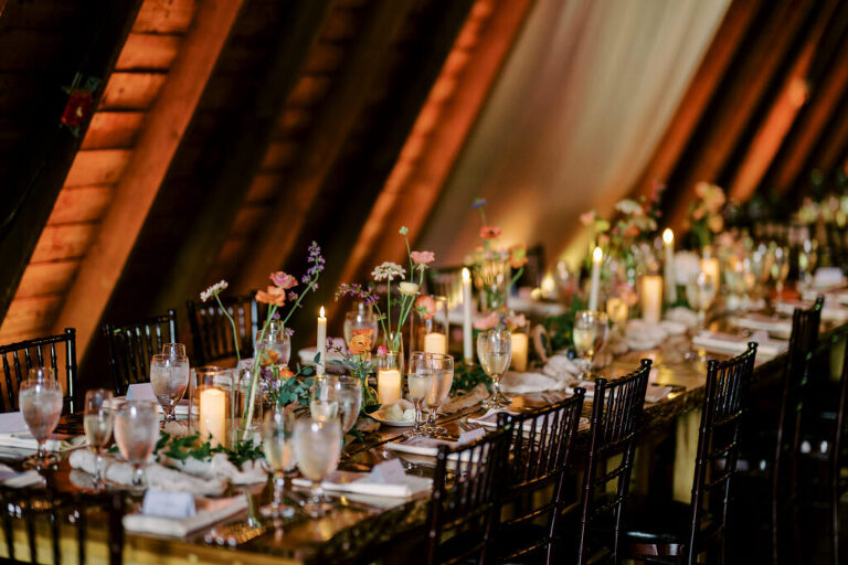 Malia and Aidan, currently residing in DC with their beloved pup Max, envisioned a wedding that reflected their laid-back, natural style. When we first chatted back in February 2023, they emphasized their desire for relaxed, fun, and candid photos that captured genuine moments.
Choosing The Barn at Perona Farms was a perfect fit for Malia and Aidan. Nestled amidst charming rustic surroundings and abundant nature, the venue complemented their preference for an authentic and unposed wedding day experience.
The ceremony took place outdoors on the lush lawn of The Barn at Perona Farms, exactly as they had envisioned – sweet, whimsy, and just the way they wanted it. Guests enjoyed a leisurely cocktail hour accompanied by live music courtesy of the talented Blue Label Band. The air was filled with the sounds of laughter and the clinking of wine glasses as everyone soaked in the joyful atmosphere.
As the evening progressed upstairs at The Barn, the ambiance was transformed by Moonlit Acres' stunning floral arrangements, candles, and elegant drapes. The space slowly filled with guests, reconnecting and sharing stories, delighted to be together again.
Then, the moment everyone had been waiting for: Malia and Aidan entered the room, surrounded by loved ones, and shared their first dance together.
Malia and Aidan's The Barn at Perona Farms NJ wedding documented by by Karis | Hey Karis | Destination Wedding Photographer | Manhattan, Catskills, Hudson Valley, Brooklyn and NJ | Destination Elopement, Destination Wedding Photographer | Hey Karis is fun documentary wedding and elopement photographer based in NY, NJ.