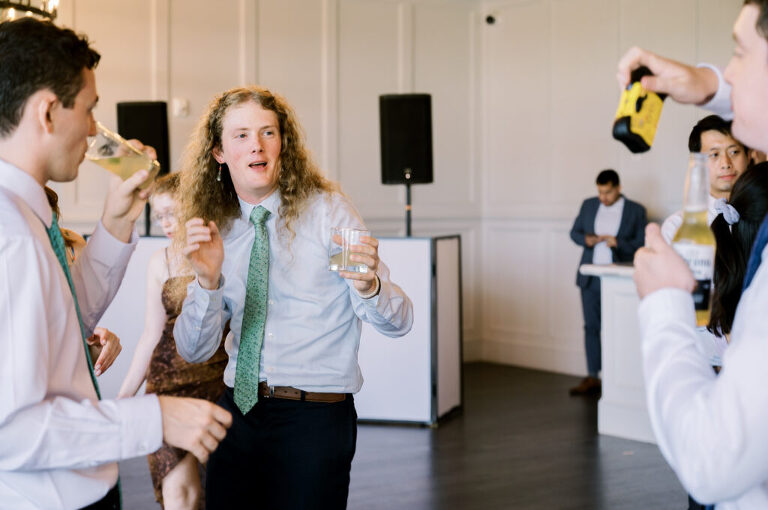 Leah and Kevin’s wedding was nothing short of enchanting—fitting for two fellow Harry Potter fans! From the emotional first look to their joyous celebration surrounded by family and friends, their special day was filled with love, laughter, and memorable moments.
Their day began early at The View at Lincoln Park, one of Jersey City’s newest and most unique wedding venues, part of the esteemed Landmark Venues collection. Nestled within the historic Lincoln Park, The View offers a modern yet timeless space with breathtaking scenery. The venue’s design is a stunning adaptive reuse of the original Lincoln Lodge (est. 1929), featuring preserved stone facades, timber beams, and antique fixtures. This blend of contemporary elegance and historic charm makes it a truly one-of-a-kind setting for weddings.
When I arrived, I was excited to explore the property and its surroundings. The View’s lush grounds, picturesque willow tree, and nearby landmarks, including the Lincoln Park Fountain, provide endless opportunities for stunning photographs. The morning was quiet as Leah and her bridesmaids arrived, carrying their dresses over their shoulders, and settled into the spacious bridal suite. Later, Kevin and their families arrived, and the anticipation began to build.
Leah and Kevin’s first look by the willow tree was a moment to remember. As the wind danced through the branches, tears filled Leah’s eyes as they read their vows to each other—an intimate, heartfelt exchange that perfectly set the tone for the day.
Guests began filling the chairs in Lincoln Room (the third-floor ceremony space), a modern area with large windows that allow natural light to flood in. This versatile room offers an elegant setting for ceremonies, with views of the surrounding park and cityscape. As Leah walked down the aisle with her father, they exchanged emotional glances, and the energy in the room was palpable.
The celebration moved to The Ballroom, The View’s stunning reception space. With its high ceilings, contemporary design, and floor-to-ceiling windows offering views of the park, the room was transformed into the perfect party atmosphere. Guests cheered as Leah and Kevin made their grand entrance, and their first dance kicked off an evening of fun, laughter, and memories.
Before the day concluded, Kevin had a special request for a photo by the Lincoln Park Fountain, a highlight of the park’s charm. We strolled over with Leah and Kevin to capture some magical portraits by the water. One of the great things about daytime weddings at The View is the ample natural light, ensuring we had beautiful lighting for photos even after the reception.
Leah and Kevin’s wedding was a joy to photograph, and The View at Lincoln Park provided the perfect backdrop for their unforgettable day. Congratulations to the happy couple—I’m so grateful to have been part of your story!
Leah and Kevin's The View at Lincoln Park Jersey City NJ documented by Karis from Hey Karis New York, Brooklyn, Hudson Valley NY and Catskills NY and NJ Wedding and NYC Elopement Photographer.
