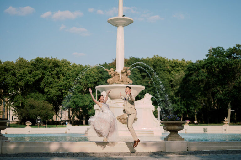 Leah and Kevin’s wedding was nothing short of enchanting—fitting for two fellow Harry Potter fans! From the emotional first look to their joyous celebration surrounded by family and friends, their special day was filled with love, laughter, and memorable moments.
Their day began early at The View at Lincoln Park, one of Jersey City’s newest and most unique wedding venues, part of the esteemed Landmark Venues collection. Nestled within the historic Lincoln Park, The View offers a modern yet timeless space with breathtaking scenery. The venue’s design is a stunning adaptive reuse of the original Lincoln Lodge (est. 1929), featuring preserved stone facades, timber beams, and antique fixtures. This blend of contemporary elegance and historic charm makes it a truly one-of-a-kind setting for weddings.
When I arrived, I was excited to explore the property and its surroundings. The View’s lush grounds, picturesque willow tree, and nearby landmarks, including the Lincoln Park Fountain, provide endless opportunities for stunning photographs. The morning was quiet as Leah and her bridesmaids arrived, carrying their dresses over their shoulders, and settled into the spacious bridal suite. Later, Kevin and their families arrived, and the anticipation began to build.
Leah and Kevin’s first look by the willow tree was a moment to remember. As the wind danced through the branches, tears filled Leah’s eyes as they read their vows to each other—an intimate, heartfelt exchange that perfectly set the tone for the day.
Guests began filling the chairs in Lincoln Room (the third-floor ceremony space), a modern area with large windows that allow natural light to flood in. This versatile room offers an elegant setting for ceremonies, with views of the surrounding park and cityscape. As Leah walked down the aisle with her father, they exchanged emotional glances, and the energy in the room was palpable.
The celebration moved to The Ballroom, The View’s stunning reception space. With its high ceilings, contemporary design, and floor-to-ceiling windows offering views of the park, the room was transformed into the perfect party atmosphere. Guests cheered as Leah and Kevin made their grand entrance, and their first dance kicked off an evening of fun, laughter, and memories.
Before the day concluded, Kevin had a special request for a photo by the Lincoln Park Fountain, a highlight of the park’s charm. We strolled over with Leah and Kevin to capture some magical portraits by the water. One of the great things about daytime weddings at The View is the ample natural light, ensuring we had beautiful lighting for photos even after the reception.
Leah and Kevin’s wedding was a joy to photograph, and The View at Lincoln Park provided the perfect backdrop for their unforgettable day. Congratulations to the happy couple—I’m so grateful to have been part of your story!
Leah and Kevin's The View at Lincoln Park Jersey City NJ documented by Karis from Hey Karis New York, Brooklyn, Hudson Valley NY and Catskills NY and NJ Wedding and NYC Elopement Photographer.
