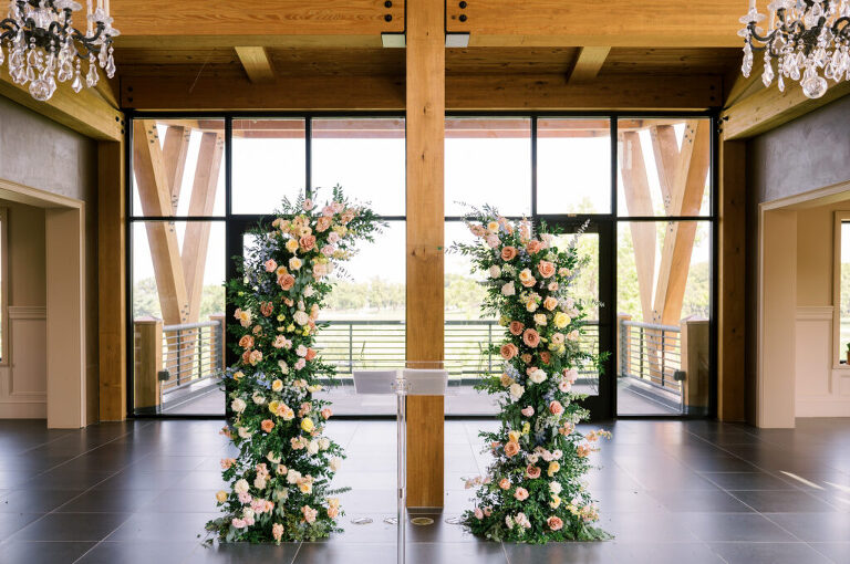 Leah and Kevin’s wedding was nothing short of enchanting—fitting for two fellow Harry Potter fans! From the emotional first look to their joyous celebration surrounded by family and friends, their special day was filled with love, laughter, and memorable moments.
Their day began early at The View at Lincoln Park, one of Jersey City’s newest and most unique wedding venues, part of the esteemed Landmark Venues collection. Nestled within the historic Lincoln Park, The View offers a modern yet timeless space with breathtaking scenery. The venue’s design is a stunning adaptive reuse of the original Lincoln Lodge (est. 1929), featuring preserved stone facades, timber beams, and antique fixtures. This blend of contemporary elegance and historic charm makes it a truly one-of-a-kind setting for weddings.
When I arrived, I was excited to explore the property and its surroundings. The View’s lush grounds, picturesque willow tree, and nearby landmarks, including the Lincoln Park Fountain, provide endless opportunities for stunning photographs. The morning was quiet as Leah and her bridesmaids arrived, carrying their dresses over their shoulders, and settled into the spacious bridal suite. Later, Kevin and their families arrived, and the anticipation began to build.
Leah and Kevin’s first look by the willow tree was a moment to remember. As the wind danced through the branches, tears filled Leah’s eyes as they read their vows to each other—an intimate, heartfelt exchange that perfectly set the tone for the day.
Guests began filling the chairs in Lincoln Room (the third-floor ceremony space), a modern area with large windows that allow natural light to flood in. This versatile room offers an elegant setting for ceremonies, with views of the surrounding park and cityscape. As Leah walked down the aisle with her father, they exchanged emotional glances, and the energy in the room was palpable.
The celebration moved to The Ballroom, The View’s stunning reception space. With its high ceilings, contemporary design, and floor-to-ceiling windows offering views of the park, the room was transformed into the perfect party atmosphere. Guests cheered as Leah and Kevin made their grand entrance, and their first dance kicked off an evening of fun, laughter, and memories.
Before the day concluded, Kevin had a special request for a photo by the Lincoln Park Fountain, a highlight of the park’s charm. We strolled over with Leah and Kevin to capture some magical portraits by the water. One of the great things about daytime weddings at The View is the ample natural light, ensuring we had beautiful lighting for photos even after the reception.
Leah and Kevin’s wedding was a joy to photograph, and The View at Lincoln Park provided the perfect backdrop for their unforgettable day. Congratulations to the happy couple—I’m so grateful to have been part of your story!
Leah and Kevin's The View at Lincoln Park Jersey City NJ documented by Karis from Hey Karis New York, Brooklyn, Hudson Valley NY and Catskills NY and NJ Wedding and NYC Elopement Photographer.
