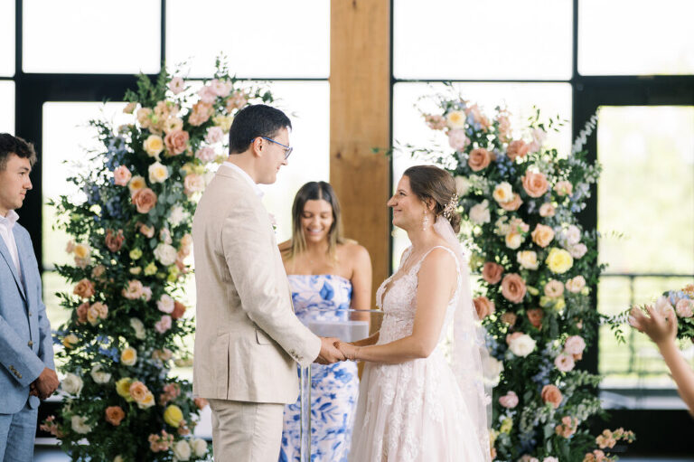 Leah and Kevin’s wedding was nothing short of enchanting—fitting for two fellow Harry Potter fans! From the emotional first look to their joyous celebration surrounded by family and friends, their special day was filled with love, laughter, and memorable moments.
Their day began early at The View at Lincoln Park, one of Jersey City’s newest and most unique wedding venues, part of the esteemed Landmark Venues collection. Nestled within the historic Lincoln Park, The View offers a modern yet timeless space with breathtaking scenery. The venue’s design is a stunning adaptive reuse of the original Lincoln Lodge (est. 1929), featuring preserved stone facades, timber beams, and antique fixtures. This blend of contemporary elegance and historic charm makes it a truly one-of-a-kind setting for weddings.
When I arrived, I was excited to explore the property and its surroundings. The View’s lush grounds, picturesque willow tree, and nearby landmarks, including the Lincoln Park Fountain, provide endless opportunities for stunning photographs. The morning was quiet as Leah and her bridesmaids arrived, carrying their dresses over their shoulders, and settled into the spacious bridal suite. Later, Kevin and their families arrived, and the anticipation began to build.
Leah and Kevin’s first look by the willow tree was a moment to remember. As the wind danced through the branches, tears filled Leah’s eyes as they read their vows to each other—an intimate, heartfelt exchange that perfectly set the tone for the day.
Guests began filling the chairs in Lincoln Room (the third-floor ceremony space), a modern area with large windows that allow natural light to flood in. This versatile room offers an elegant setting for ceremonies, with views of the surrounding park and cityscape. As Leah walked down the aisle with her father, they exchanged emotional glances, and the energy in the room was palpable.
The celebration moved to The Ballroom, The View’s stunning reception space. With its high ceilings, contemporary design, and floor-to-ceiling windows offering views of the park, the room was transformed into the perfect party atmosphere. Guests cheered as Leah and Kevin made their grand entrance, and their first dance kicked off an evening of fun, laughter, and memories.
Before the day concluded, Kevin had a special request for a photo by the Lincoln Park Fountain, a highlight of the park’s charm. We strolled over with Leah and Kevin to capture some magical portraits by the water. One of the great things about daytime weddings at The View is the ample natural light, ensuring we had beautiful lighting for photos even after the reception.
Leah and Kevin’s wedding was a joy to photograph, and The View at Lincoln Park provided the perfect backdrop for their unforgettable day. Congratulations to the happy couple—I’m so grateful to have been part of your story!
Leah and Kevin's The View at Lincoln Park Jersey City NJ documented by Karis from Hey Karis New York, Brooklyn, Hudson Valley NY and Catskills NY and NJ Wedding and NYC Elopement Photographer.
