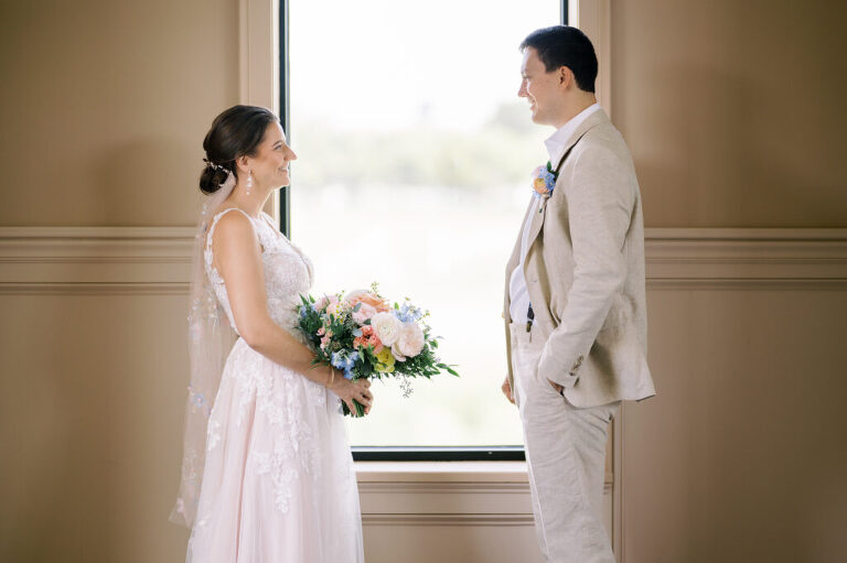 Leah and Kevin’s wedding was nothing short of enchanting—fitting for two fellow Harry Potter fans! From the emotional first look to their joyous celebration surrounded by family and friends, their special day was filled with love, laughter, and memorable moments.
Their day began early at The View at Lincoln Park, one of Jersey City’s newest and most unique wedding venues, part of the esteemed Landmark Venues collection. Nestled within the historic Lincoln Park, The View offers a modern yet timeless space with breathtaking scenery. The venue’s design is a stunning adaptive reuse of the original Lincoln Lodge (est. 1929), featuring preserved stone facades, timber beams, and antique fixtures. This blend of contemporary elegance and historic charm makes it a truly one-of-a-kind setting for weddings.
When I arrived, I was excited to explore the property and its surroundings. The View’s lush grounds, picturesque willow tree, and nearby landmarks, including the Lincoln Park Fountain, provide endless opportunities for stunning photographs. The morning was quiet as Leah and her bridesmaids arrived, carrying their dresses over their shoulders, and settled into the spacious bridal suite. Later, Kevin and their families arrived, and the anticipation began to build.
Leah and Kevin’s first look by the willow tree was a moment to remember. As the wind danced through the branches, tears filled Leah’s eyes as they read their vows to each other—an intimate, heartfelt exchange that perfectly set the tone for the day.
Guests began filling the chairs in Lincoln Room (the third-floor ceremony space), a modern area with large windows that allow natural light to flood in. This versatile room offers an elegant setting for ceremonies, with views of the surrounding park and cityscape. As Leah walked down the aisle with her father, they exchanged emotional glances, and the energy in the room was palpable.
The celebration moved to The Ballroom, The View’s stunning reception space. With its high ceilings, contemporary design, and floor-to-ceiling windows offering views of the park, the room was transformed into the perfect party atmosphere. Guests cheered as Leah and Kevin made their grand entrance, and their first dance kicked off an evening of fun, laughter, and memories.
Before the day concluded, Kevin had a special request for a photo by the Lincoln Park Fountain, a highlight of the park’s charm. We strolled over with Leah and Kevin to capture some magical portraits by the water. One of the great things about daytime weddings at The View is the ample natural light, ensuring we had beautiful lighting for photos even after the reception.
Leah and Kevin’s wedding was a joy to photograph, and The View at Lincoln Park provided the perfect backdrop for their unforgettable day. Congratulations to the happy couple—I’m so grateful to have been part of your story!
Leah and Kevin's The View at Lincoln Park Jersey City NJ documented by Karis from Hey Karis New York, Brooklyn, Hudson Valley NY and Catskills NY and NJ Wedding and NYC Elopement Photographer.
