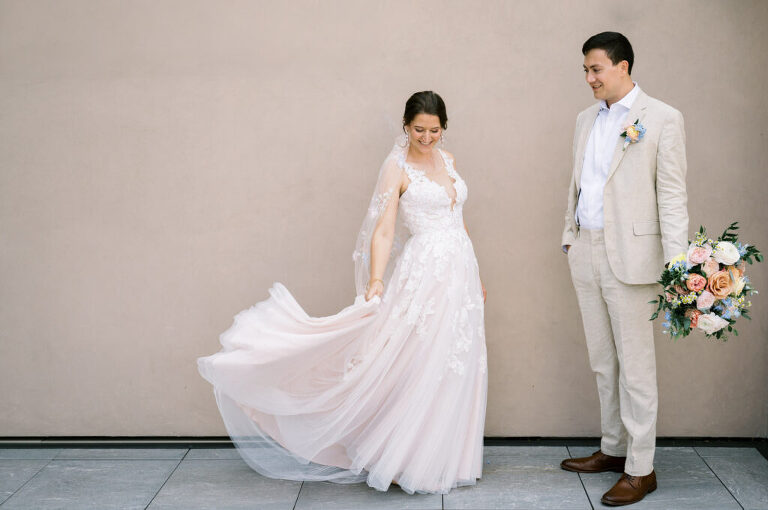 Leah and Kevin’s wedding was nothing short of enchanting—fitting for two fellow Harry Potter fans! From the emotional first look to their joyous celebration surrounded by family and friends, their special day was filled with love, laughter, and memorable moments.
Their day began early at The View at Lincoln Park, one of Jersey City’s newest and most unique wedding venues, part of the esteemed Landmark Venues collection. Nestled within the historic Lincoln Park, The View offers a modern yet timeless space with breathtaking scenery. The venue’s design is a stunning adaptive reuse of the original Lincoln Lodge (est. 1929), featuring preserved stone facades, timber beams, and antique fixtures. This blend of contemporary elegance and historic charm makes it a truly one-of-a-kind setting for weddings.
When I arrived, I was excited to explore the property and its surroundings. The View’s lush grounds, picturesque willow tree, and nearby landmarks, including the Lincoln Park Fountain, provide endless opportunities for stunning photographs. The morning was quiet as Leah and her bridesmaids arrived, carrying their dresses over their shoulders, and settled into the spacious bridal suite. Later, Kevin and their families arrived, and the anticipation began to build.
Leah and Kevin’s first look by the willow tree was a moment to remember. As the wind danced through the branches, tears filled Leah’s eyes as they read their vows to each other—an intimate, heartfelt exchange that perfectly set the tone for the day.
Guests began filling the chairs in Lincoln Room (the third-floor ceremony space), a modern area with large windows that allow natural light to flood in. This versatile room offers an elegant setting for ceremonies, with views of the surrounding park and cityscape. As Leah walked down the aisle with her father, they exchanged emotional glances, and the energy in the room was palpable.
The celebration moved to The Ballroom, The View’s stunning reception space. With its high ceilings, contemporary design, and floor-to-ceiling windows offering views of the park, the room was transformed into the perfect party atmosphere. Guests cheered as Leah and Kevin made their grand entrance, and their first dance kicked off an evening of fun, laughter, and memories.
Before the day concluded, Kevin had a special request for a photo by the Lincoln Park Fountain, a highlight of the park’s charm. We strolled over with Leah and Kevin to capture some magical portraits by the water. One of the great things about daytime weddings at The View is the ample natural light, ensuring we had beautiful lighting for photos even after the reception.
Leah and Kevin’s wedding was a joy to photograph, and The View at Lincoln Park provided the perfect backdrop for their unforgettable day. Congratulations to the happy couple—I’m so grateful to have been part of your story!
Leah and Kevin's The View at Lincoln Park Jersey City NJ documented by Karis from Hey Karis New York, Brooklyn, Hudson Valley NY and Catskills NY and NJ Wedding and NYC Elopement Photographer.
