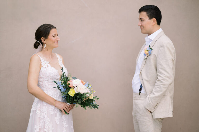 Leah and Kevin’s wedding was nothing short of enchanting—fitting for two fellow Harry Potter fans! From the emotional first look to their joyous celebration surrounded by family and friends, their special day was filled with love, laughter, and memorable moments.
Their day began early at The View at Lincoln Park, one of Jersey City’s newest and most unique wedding venues, part of the esteemed Landmark Venues collection. Nestled within the historic Lincoln Park, The View offers a modern yet timeless space with breathtaking scenery. The venue’s design is a stunning adaptive reuse of the original Lincoln Lodge (est. 1929), featuring preserved stone facades, timber beams, and antique fixtures. This blend of contemporary elegance and historic charm makes it a truly one-of-a-kind setting for weddings.
When I arrived, I was excited to explore the property and its surroundings. The View’s lush grounds, picturesque willow tree, and nearby landmarks, including the Lincoln Park Fountain, provide endless opportunities for stunning photographs. The morning was quiet as Leah and her bridesmaids arrived, carrying their dresses over their shoulders, and settled into the spacious bridal suite. Later, Kevin and their families arrived, and the anticipation began to build.
Leah and Kevin’s first look by the willow tree was a moment to remember. As the wind danced through the branches, tears filled Leah’s eyes as they read their vows to each other—an intimate, heartfelt exchange that perfectly set the tone for the day.
Guests began filling the chairs in Lincoln Room (the third-floor ceremony space), a modern area with large windows that allow natural light to flood in. This versatile room offers an elegant setting for ceremonies, with views of the surrounding park and cityscape. As Leah walked down the aisle with her father, they exchanged emotional glances, and the energy in the room was palpable.
The celebration moved to The Ballroom, The View’s stunning reception space. With its high ceilings, contemporary design, and floor-to-ceiling windows offering views of the park, the room was transformed into the perfect party atmosphere. Guests cheered as Leah and Kevin made their grand entrance, and their first dance kicked off an evening of fun, laughter, and memories.
Before the day concluded, Kevin had a special request for a photo by the Lincoln Park Fountain, a highlight of the park’s charm. We strolled over with Leah and Kevin to capture some magical portraits by the water. One of the great things about daytime weddings at The View is the ample natural light, ensuring we had beautiful lighting for photos even after the reception.
Leah and Kevin’s wedding was a joy to photograph, and The View at Lincoln Park provided the perfect backdrop for their unforgettable day. Congratulations to the happy couple—I’m so grateful to have been part of your story!
Leah and Kevin's The View at Lincoln Park Jersey City NJ documented by Karis from Hey Karis New York, Brooklyn, Hudson Valley NY and Catskills NY and NJ Wedding and NYC Elopement Photographer.
