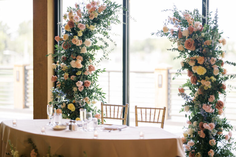 Leah and Kevin’s wedding was nothing short of enchanting—fitting for two fellow Harry Potter fans! From the emotional first look to their joyous celebration surrounded by family and friends, their special day was filled with love, laughter, and memorable moments.
Their day began early at The View at Lincoln Park, one of Jersey City’s newest and most unique wedding venues, part of the esteemed Landmark Venues collection. Nestled within the historic Lincoln Park, The View offers a modern yet timeless space with breathtaking scenery. The venue’s design is a stunning adaptive reuse of the original Lincoln Lodge (est. 1929), featuring preserved stone facades, timber beams, and antique fixtures. This blend of contemporary elegance and historic charm makes it a truly one-of-a-kind setting for weddings.
When I arrived, I was excited to explore the property and its surroundings. The View’s lush grounds, picturesque willow tree, and nearby landmarks, including the Lincoln Park Fountain, provide endless opportunities for stunning photographs. The morning was quiet as Leah and her bridesmaids arrived, carrying their dresses over their shoulders, and settled into the spacious bridal suite. Later, Kevin and their families arrived, and the anticipation began to build.
Leah and Kevin’s first look by the willow tree was a moment to remember. As the wind danced through the branches, tears filled Leah’s eyes as they read their vows to each other—an intimate, heartfelt exchange that perfectly set the tone for the day.
Guests began filling the chairs in Lincoln Room (the third-floor ceremony space), a modern area with large windows that allow natural light to flood in. This versatile room offers an elegant setting for ceremonies, with views of the surrounding park and cityscape. As Leah walked down the aisle with her father, they exchanged emotional glances, and the energy in the room was palpable.
The celebration moved to The Ballroom, The View’s stunning reception space. With its high ceilings, contemporary design, and floor-to-ceiling windows offering views of the park, the room was transformed into the perfect party atmosphere. Guests cheered as Leah and Kevin made their grand entrance, and their first dance kicked off an evening of fun, laughter, and memories.
Before the day concluded, Kevin had a special request for a photo by the Lincoln Park Fountain, a highlight of the park’s charm. We strolled over with Leah and Kevin to capture some magical portraits by the water. One of the great things about daytime weddings at The View is the ample natural light, ensuring we had beautiful lighting for photos even after the reception.
Leah and Kevin’s wedding was a joy to photograph, and The View at Lincoln Park provided the perfect backdrop for their unforgettable day. Congratulations to the happy couple—I’m so grateful to have been part of your story!
Leah and Kevin's The View at Lincoln Park Jersey City NJ documented by Karis from Hey Karis New York, Brooklyn, Hudson Valley NY and Catskills NY and NJ Wedding and NYC Elopement Photographer.
