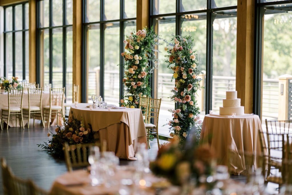 Leah and Kevin’s wedding was nothing short of enchanting—fitting for two fellow Harry Potter fans! From the emotional first look to their joyous celebration surrounded by family and friends, their special day was filled with love, laughter, and memorable moments.
Their day began early at The View at Lincoln Park, one of Jersey City’s newest and most unique wedding venues, part of the esteemed Landmark Venues collection. Nestled within the historic Lincoln Park, The View offers a modern yet timeless space with breathtaking scenery. The venue’s design is a stunning adaptive reuse of the original Lincoln Lodge (est. 1929), featuring preserved stone facades, timber beams, and antique fixtures. This blend of contemporary elegance and historic charm makes it a truly one-of-a-kind setting for weddings.
When I arrived, I was excited to explore the property and its surroundings. The View’s lush grounds, picturesque willow tree, and nearby landmarks, including the Lincoln Park Fountain, provide endless opportunities for stunning photographs. The morning was quiet as Leah and her bridesmaids arrived, carrying their dresses over their shoulders, and settled into the spacious bridal suite. Later, Kevin and their families arrived, and the anticipation began to build.
Leah and Kevin’s first look by the willow tree was a moment to remember. As the wind danced through the branches, tears filled Leah’s eyes as they read their vows to each other—an intimate, heartfelt exchange that perfectly set the tone for the day.
Guests began filling the chairs in Lincoln Room (the third-floor ceremony space), a modern area with large windows that allow natural light to flood in. This versatile room offers an elegant setting for ceremonies, with views of the surrounding park and cityscape. As Leah walked down the aisle with her father, they exchanged emotional glances, and the energy in the room was palpable.
The celebration moved to The Ballroom, The View’s stunning reception space. With its high ceilings, contemporary design, and floor-to-ceiling windows offering views of the park, the room was transformed into the perfect party atmosphere. Guests cheered as Leah and Kevin made their grand entrance, and their first dance kicked off an evening of fun, laughter, and memories.
Before the day concluded, Kevin had a special request for a photo by the Lincoln Park Fountain, a highlight of the park’s charm. We strolled over with Leah and Kevin to capture some magical portraits by the water. One of the great things about daytime weddings at The View is the ample natural light, ensuring we had beautiful lighting for photos even after the reception.
Leah and Kevin’s wedding was a joy to photograph, and The View at Lincoln Park provided the perfect backdrop for their unforgettable day. Congratulations to the happy couple—I’m so grateful to have been part of your story!
Leah and Kevin's The View at Lincoln Park Jersey City NJ documented by Karis from Hey Karis New York, Brooklyn, Hudson Valley NY and Catskills NY and NJ Wedding and NYC Elopement Photographer.
