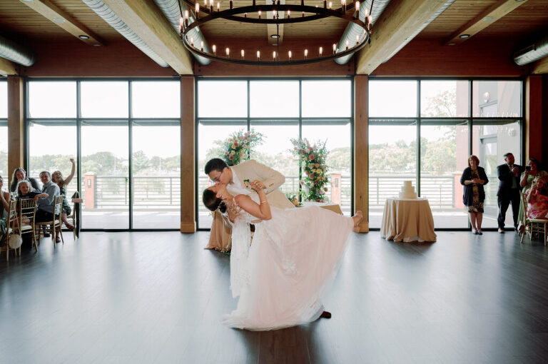 Leah and Kevin’s wedding was nothing short of enchanting—fitting for two fellow Harry Potter fans! From the emotional first look to their joyous celebration surrounded by family and friends, their special day was filled with love, laughter, and memorable moments.
Their day began early at The View at Lincoln Park, one of Jersey City’s newest and most unique wedding venues, part of the esteemed Landmark Venues collection. Nestled within the historic Lincoln Park, The View offers a modern yet timeless space with breathtaking scenery. The venue’s design is a stunning adaptive reuse of the original Lincoln Lodge (est. 1929), featuring preserved stone facades, timber beams, and antique fixtures. This blend of contemporary elegance and historic charm makes it a truly one-of-a-kind setting for weddings.
When I arrived, I was excited to explore the property and its surroundings. The View’s lush grounds, picturesque willow tree, and nearby landmarks, including the Lincoln Park Fountain, provide endless opportunities for stunning photographs. The morning was quiet as Leah and her bridesmaids arrived, carrying their dresses over their shoulders, and settled into the spacious bridal suite. Later, Kevin and their families arrived, and the anticipation began to build.
Leah and Kevin’s first look by the willow tree was a moment to remember. As the wind danced through the branches, tears filled Leah’s eyes as they read their vows to each other—an intimate, heartfelt exchange that perfectly set the tone for the day.
Guests began filling the chairs in Lincoln Room (the third-floor ceremony space), a modern area with large windows that allow natural light to flood in. This versatile room offers an elegant setting for ceremonies, with views of the surrounding park and cityscape. As Leah walked down the aisle with her father, they exchanged emotional glances, and the energy in the room was palpable.
The celebration moved to The Ballroom, The View’s stunning reception space. With its high ceilings, contemporary design, and floor-to-ceiling windows offering views of the park, the room was transformed into the perfect party atmosphere. Guests cheered as Leah and Kevin made their grand entrance, and their first dance kicked off an evening of fun, laughter, and memories.
Before the day concluded, Kevin had a special request for a photo by the Lincoln Park Fountain, a highlight of the park’s charm. We strolled over with Leah and Kevin to capture some magical portraits by the water. One of the great things about daytime weddings at The View is the ample natural light, ensuring we had beautiful lighting for photos even after the reception.
Leah and Kevin’s wedding was a joy to photograph, and The View at Lincoln Park provided the perfect backdrop for their unforgettable day. Congratulations to the happy couple—I’m so grateful to have been part of your story!
Leah and Kevin's The View at Lincoln Park Jersey City NJ documented by Karis from Hey Karis New York, Brooklyn, Hudson Valley NY and Catskills NY and NJ Wedding and NYC Elopement Photographer.
