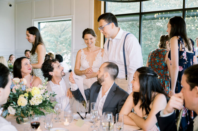 Leah and Kevin’s wedding was nothing short of enchanting—fitting for two fellow Harry Potter fans! From the emotional first look to their joyous celebration surrounded by family and friends, their special day was filled with love, laughter, and memorable moments.
Their day began early at The View at Lincoln Park, one of Jersey City’s newest and most unique wedding venues, part of the esteemed Landmark Venues collection. Nestled within the historic Lincoln Park, The View offers a modern yet timeless space with breathtaking scenery. The venue’s design is a stunning adaptive reuse of the original Lincoln Lodge (est. 1929), featuring preserved stone facades, timber beams, and antique fixtures. This blend of contemporary elegance and historic charm makes it a truly one-of-a-kind setting for weddings.
When I arrived, I was excited to explore the property and its surroundings. The View’s lush grounds, picturesque willow tree, and nearby landmarks, including the Lincoln Park Fountain, provide endless opportunities for stunning photographs. The morning was quiet as Leah and her bridesmaids arrived, carrying their dresses over their shoulders, and settled into the spacious bridal suite. Later, Kevin and their families arrived, and the anticipation began to build.
Leah and Kevin’s first look by the willow tree was a moment to remember. As the wind danced through the branches, tears filled Leah’s eyes as they read their vows to each other—an intimate, heartfelt exchange that perfectly set the tone for the day.
Guests began filling the chairs in Lincoln Room (the third-floor ceremony space), a modern area with large windows that allow natural light to flood in. This versatile room offers an elegant setting for ceremonies, with views of the surrounding park and cityscape. As Leah walked down the aisle with her father, they exchanged emotional glances, and the energy in the room was palpable.
The celebration moved to The Ballroom, The View’s stunning reception space. With its high ceilings, contemporary design, and floor-to-ceiling windows offering views of the park, the room was transformed into the perfect party atmosphere. Guests cheered as Leah and Kevin made their grand entrance, and their first dance kicked off an evening of fun, laughter, and memories.
Before the day concluded, Kevin had a special request for a photo by the Lincoln Park Fountain, a highlight of the park’s charm. We strolled over with Leah and Kevin to capture some magical portraits by the water. One of the great things about daytime weddings at The View is the ample natural light, ensuring we had beautiful lighting for photos even after the reception.
Leah and Kevin’s wedding was a joy to photograph, and The View at Lincoln Park provided the perfect backdrop for their unforgettable day. Congratulations to the happy couple—I’m so grateful to have been part of your story!
Leah and Kevin's The View at Lincoln Park Jersey City NJ documented by Karis from Hey Karis New York, Brooklyn, Hudson Valley NY and Catskills NY and NJ Wedding and NYC Elopement Photographer.
